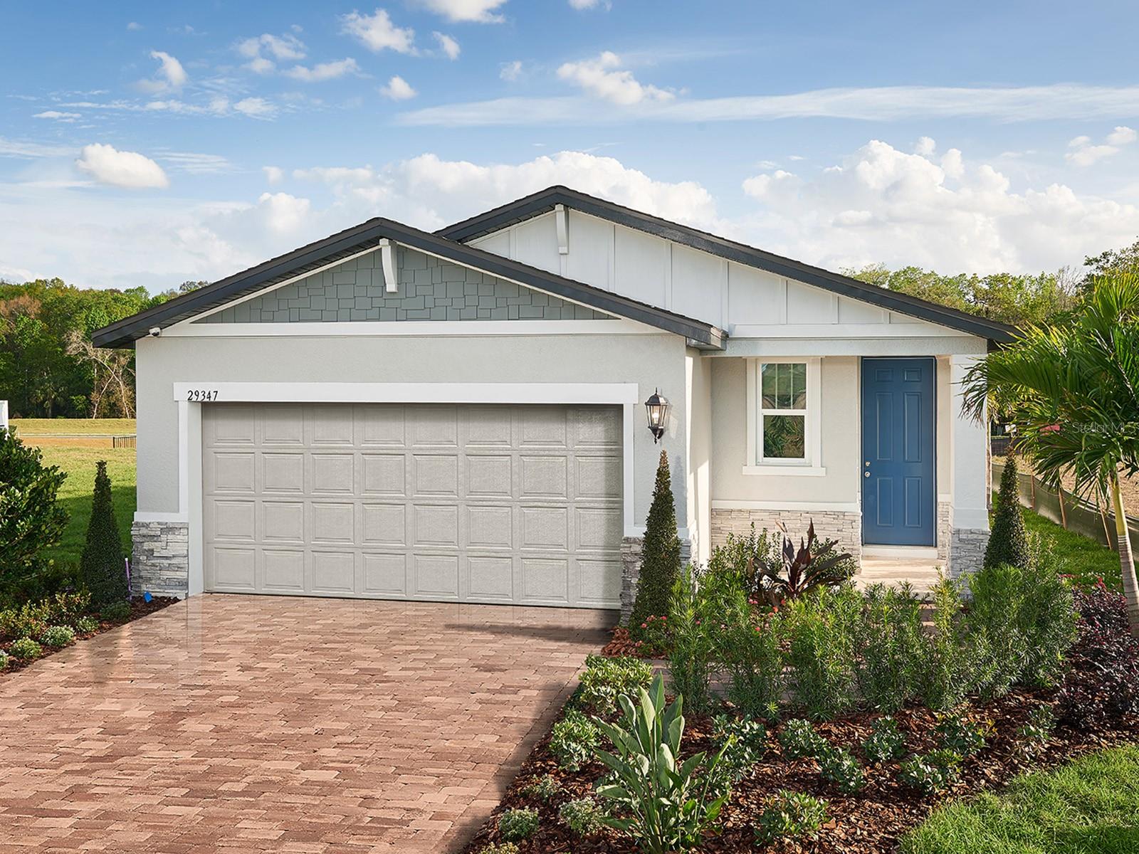 This fabulous former Meritage Homes Everglade model is ready for its first occupants! This 3 bedroom 2 bath open floor plan home features an attached 2 car attached garage. Your brand new kitchen comes equipped with Whirlpool stainless steel appliances including gas range, granite countertops, and kitchen island. Primary bath features large walk-in tiled shower with glass enclosure. Secondary bath features tub/shower combo. The laundry room includes a full-sized washer and dryer. This home also features many energy savings features such as spray foam insulation, digital thermostat, and Low E double-paned windows helping you save money on your electric bill. Large screen wall mounted TV in great room is included for your use. Security cameras are also included. Enjoy Central Florida weather with access to the community pool and cabana. Less than 1.5 miles from grocery and shopping.  7 miles from Turnpike.  Call today for more details and to schedule a showing.  Pet Friendly.