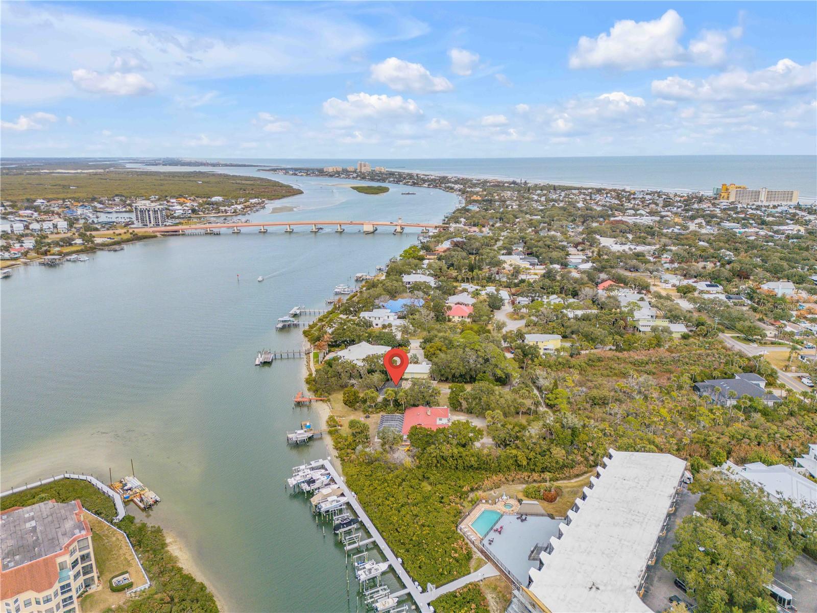 Direct Beachside deep water Intracoastal Waterway between Flagler Ave and 3rd Avenue New Smyrna Beach. This oversized riverfront parcel totals approximately 0.65 acres with roughly 100 feet of water frontage and a deep lot depth. Current zoning is single-family residential. Enjoy expansive water views, boating access, and proximity to beaches, dining, and shopping while still offering privacy rarely available along the Intracoastal Waterway.