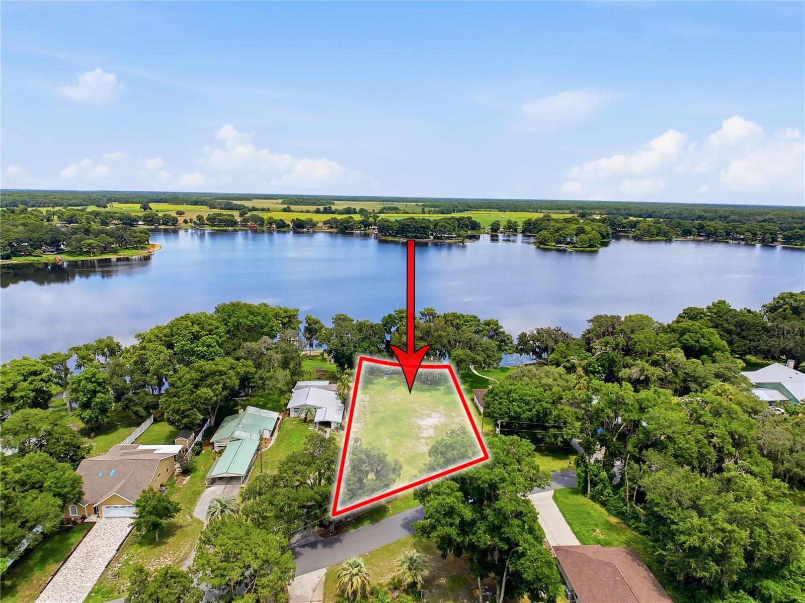 Build your dream home in one of Citrus County’s most charming communities! This rare double lot offers over half an acre of cleared land, giving you plenty of space for your custom home, outdoor living, and more. Even better, the impact fee has already been paid, providing valuable savings as you begin the building process. Public water and septic. Located just moments from Church Lake and the scenic Tsala Apopka Lake chain, you’ll enjoy easy access to boating, fishing, kayaking, air boating, and breathtaking Florida sunsets. Nature lovers will appreciate the abundant wildlife and peaceful surroundings, while outdoor enthusiasts can take advantage of the nearby lakes and waterways. Nestled in the heart of Floral City, you’ll fall in love with the town’s timeless charm, majestic oak-lined streets, historic character, and relaxed small-town atmosphere. Conveniently located near the Withlacoochee State Trail, local parks, shopping, and dining, this property offers the perfect balance of tranquility and accessibility. Don’t miss this exceptional opportunity to own a spacious homesite in one of Florida’s most picturesque communities.