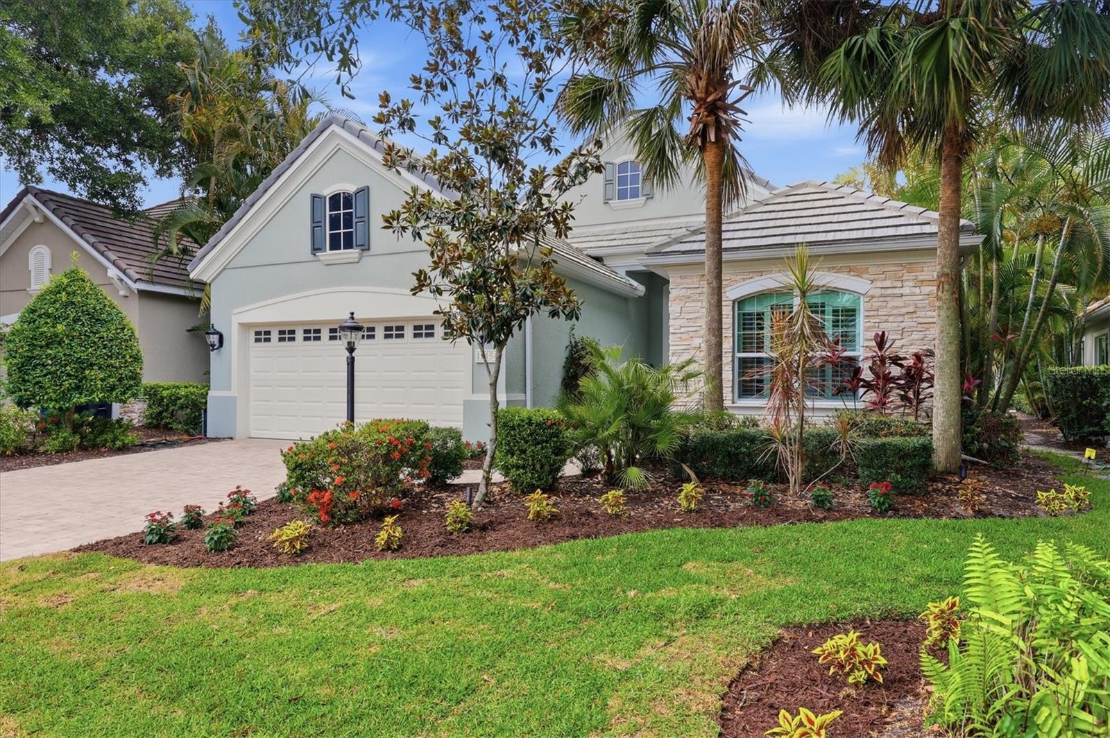 Welcome to an exceptional opportunity within the award winning Lakewood Ranch Country Club, where luxury living, breathtaking golf course views, and resort-style amenities come together in one of Southwest Florida's most sought-after communities.

This beautifully maintained residence offers two spacious bedrooms, two full bathrooms, and a versatile den/home office that can easily serve as a third bedroom, providing flexibility for guests, remote work, or additional living space. The thoughtfully designed floor plan features a sizeable kitchen with abundant cabinetry, expansive countertop space, and stainless-steel appliances, creating the perfect setting for everyday living, meal preparation, and entertaining family and friends.

Step outside and discover your own private Florida retreat. The outdoor living area is designed for year-round enjoyment and includes a heated swimming pool, covered lanai, and outdoor kitchen—ideal for relaxing afternoons, al fresco dining, and hosting memorable gatherings. Positioned along the fourth hole of the Kings Dunes golf course, the home enjoys a picturesque backdrop of lush fairways and a heavily wooded preserve area that provides exceptional privacy and a stunning natural view corridor rarely found in golf course communities.

Residents of Lakewood Ranch Country Club have the opportunity to opt into club membership for the championship golf courses, tennis and pickleball courts, fitness facilities, social activities, dining venues, and beautifully maintained grounds that exemplify the country club lifestyle. Beyond the gates, the award-winning master-planned community of Lakewood Ranch offers an unmatched lifestyle with nearby shopping, restaurants, medical facilities, parks, walking and biking trails, top-rated schools, and year-round community events. Convenient access to downtown Sarasota, world-renowned Gulf Coast beaches, and multiple airports makes this location as practical as it is desirable.

Whether you're seeking a full-time residence, seasonal retreat, or a place to enjoy the best of Florida living, this exceptional home delivers comfort, privacy, and an outstanding lifestyle in the heart of Lakewood Ranch.
