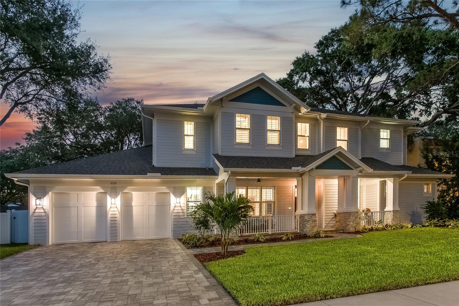 Welcome to the epitome of luxury. This exceptional custom built smart home offers an unparalleled lifestyle you must experience in person to truly grasp the significance of its tailor-made features. Situated in the prestigious South Tampa neighborhood of Virginia Park, this home is a true masterpiece crafted with the finest materials and cutting edge technology, all designed to cater to your every need. The recently updated exterior and interior paint, along with all new landscaping and sod, create a welcoming atmosphere. As you enter the gorgeous 8 foot custom mahogany door, you are greeted with soaring vaulted ceilings and 28 feet of oversized sliding glass doors that fold into each other, seamlessly, blending the indoor and outdoor space. This design allows easy access to the expansive covered Lanai with travertine pavers and features a stunning, heated saltwater pool and spa. In the living area, the stacked stone wall is accentuated by an electric fireplace and a unique 150 year old axe cut wood mantle adding character and style. The top-of-the-line kitchen is perfect for all your culinary endeavors with a Sub-Zero, paneled, 6' x 3' refrigerator and 6' x 3' freezer, offering ample storage. While the Jenn Air gas cooktop with oversized hood and 2 Jenn Air built-in ovens provide excellent cooking capabilities. There is also a custom paneled Jenn Air dishwasher and built-in wine fridge. All of these appliances are complemented by wood cabinets and stunning Delicatus white granite countertops, island and a dry bar. Entertainment is taken to another level with a 20’ x 16’ game room leading directly into a soundproof theater. The theater is equipped with 120" screen and state of the art 4K Sony HDR home theater projector, creating a captivating cinematic experience. One notable highlight of the property is the Elevator providing convenient access to the second floor. This spacious home has five bedrooms, each accompanied by its own en-suite bathroom and walk-in closet. The primary suite is a sanctuary of comfort, showcasing a lavish bathroom. The stacked stone wall gives a touch of rustic charm to the double entry into the walk-in shower with built-in bench and 3 shower heads, providing a spa-like experience. The vintage freestanding, soaking tub with signature Telephone faucet makes the space a true retreat after a long day. The versatility of this home excels with the thoughtfully designed in-law suite or au pair room on the first floor. This space is perfect for privacy and comfort. Off the oversized 2 car garage there is a 8' x 8' air conditioned storage room with a second washer and dryer hookup and shelving units. Providing the perfect solution for keeping your seasonal and extra possessions safe from the elements. Words can only paint a partial picture of the splendor that awaits. Experiencing it firsthand is a must, it’s a testament to the art of fine, comfortable living. Room Feature: Linen Closet In Bath (Interior In-Law Suite).
