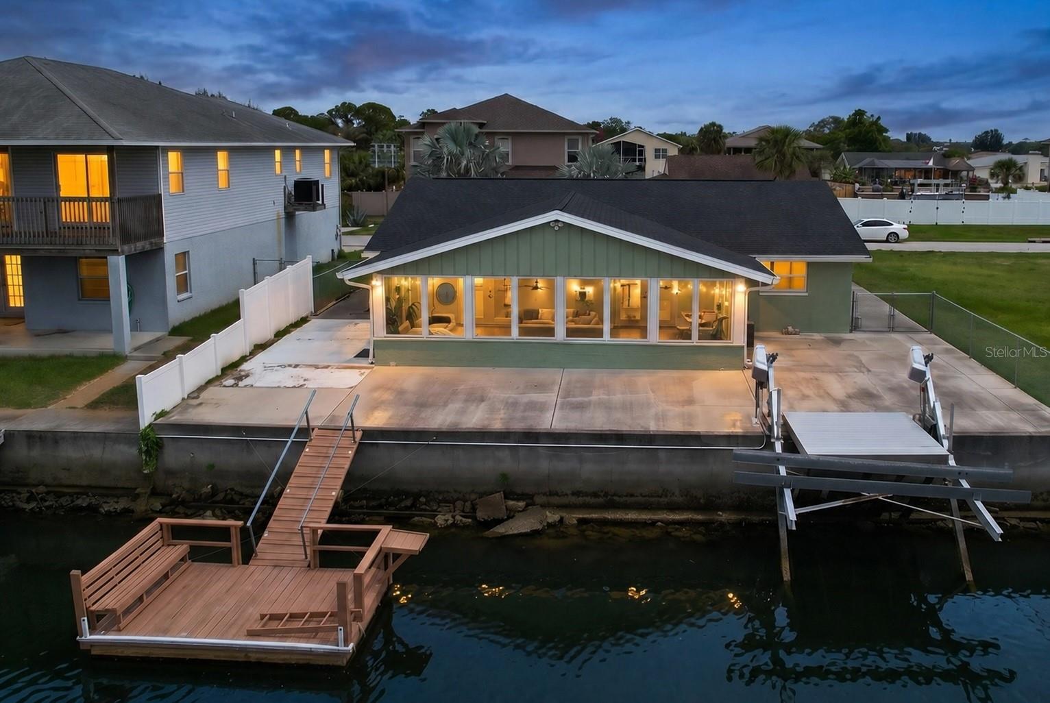 Virtually Staged. **Waterfront opportunities like this don't come along often.**

Completely renovated after Hurricane Helene and now offered at nearly **$90,000 less than the current owners paid just three years ago**, this beautifully updated Gulf-access home represents one of the best waterfront values on Florida's Nature Coast. If you've dreamed of affordable waterfront living without sacrificing modern finishes, peace of mind, or boating access, this is the opportunity you've been waiting for.

Launch your boat from your own backyard and be on the open Gulf of Mexico in minutes. With **direct Gulf access, no bridges, a private dock, and a 10,000-pound boat lift**, every day can begin with a fishing trip, a cruise to nearby islands, or a sunset ride on the water. From the backyard, enjoy peaceful canal views where dolphins and manatees are frequent visitors.

Inside, this thoughtfully renovated home offers a bright, open layout designed for comfortable everyday living and effortless entertaining. The beautifully updated kitchen features new cabinetry, countertops, stainless steel appliances, a breakfast bar, and an adjoining dining area. Tile flooring flows throughout the home, while the spacious primary suite and en-suite bath have been tastefully remodeled. A dedicated office provides the flexibility today's buyers need for working from home, hobbies, or accommodating overnight guests.

One of the home's standout features is the **435-square-foot finished and enclosed waterfront lanai**. Surrounded by impact windows and overlooking the canal, this incredible space seamlessly expands the home's living area when the glass French doors are opened, creating the perfect setting for entertaining, relaxing with family and friends, or simply enjoying Florida's waterfront lifestyle year-round.

Extensive improvements provide added confidence and value, including a **new roof (2023), elevated HVAC system (2025), updated electrical system, hurricane-impact windows and doors throughout most of the home, renovated bathrooms, and a completely updated kitchen.** Even better, the home offers the valuable benefit of **assumable flood insurance**, helping make waterfront ownership even more affordable.

Outside, the fully fenced backyard offers plenty of room for pets, entertaining, or adding a future hot tub. A floating dock, spacious garage, and additional concrete parking for a boat or trailer complete the package.

Located in the desirable **Sea Pines** waterfront community, residents enjoy access to a private clubhouse, community park, boat ramp, and community dock—all with **no mandatory HOA fees.** Just minutes from SunWest Park, local restaurants, shopping, and entertainment, you'll enjoy the perfect blend of convenience and Florida's laid-back coastal lifestyle.

Whether you're searching for a full-time residence, seasonal retreat, or waterfront investment, this home offers an exceptional combination of extensive renovations, direct Gulf boating access, modern upgrades, and outstanding value that's increasingly difficult to find. Come experience the waterfront lifestyle you've always imagined.