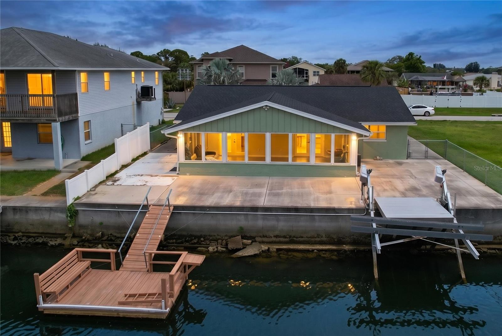 Virtually Staged. **Waterfront opportunities like this don't come along often.**

Completely renovated after Hurricane Helene and now offered at nearly **$90,000 less than the current owners paid just three years ago**, this beautifully updated Gulf-access home represents one of the best waterfront values on Florida's Nature Coast. If you've dreamed of affordable waterfront living without sacrificing modern finishes, peace of mind, or boating access, this is the opportunity you've been waiting for.

Launch your boat from your own backyard and be on the open Gulf of Mexico in minutes. With **direct Gulf access, no bridges, a private dock, and a 10,000-pound boat lift**, every day can begin with a fishing trip, a cruise to nearby islands, or a sunset ride on the water. From the backyard, enjoy peaceful canal views where dolphins and manatees are frequent visitors.

Inside, this thoughtfully renovated home offers a bright, open layout designed for comfortable everyday living and effortless entertaining. The beautifully updated kitchen features new cabinetry, countertops, stainless steel appliances, a breakfast bar, and an adjoining dining area. Tile flooring flows throughout the home, while the spacious primary suite and en-suite bath have been tastefully remodeled. A dedicated office provides the flexibility today's buyers need for working from home, hobbies, or accommodating overnight guests.

One of the home's standout features is the **435-square-foot finished and enclosed waterfront lanai**. Surrounded by impact windows and overlooking the canal, this incredible space seamlessly expands the home's living area when the sliding glass doors are opened, creating the perfect setting for entertaining, relaxing with family and friends, or simply enjoying Florida's waterfront lifestyle year-round.

Extensive improvements provide added confidence and value, including a **new roof (2023), elevated HVAC system (2025), updated electrical system, hurricane-impact windows and doors throughout most of the home, renovated bathrooms, and a completely updated kitchen.** Even better, the home offers the valuable benefit of **assumable flood insurance**, helping make waterfront ownership even more affordable.

Outside, the fully fenced backyard offers plenty of room for pets, entertaining, or adding a future hot tub. A floating dock, spacious garage, and additional concrete parking for a boat or trailer complete the package.

Located in the desirable **Sea Pines** waterfront community, residents enjoy access to a private clubhouse, community park, boat ramp, and community dock—all with **no mandatory HOA fees.** Just minutes from SunWest Park, local restaurants, shopping, and entertainment, you'll enjoy the perfect blend of convenience and Florida's laid-back coastal lifestyle.

Whether you're searching for a full-time residence, seasonal retreat, or waterfront investment, this home offers an exceptional combination of extensive renovations, direct Gulf boating access, modern upgrades, and outstanding value that's increasingly difficult to find. Come experience the waterfront lifestyle you've always imagined.