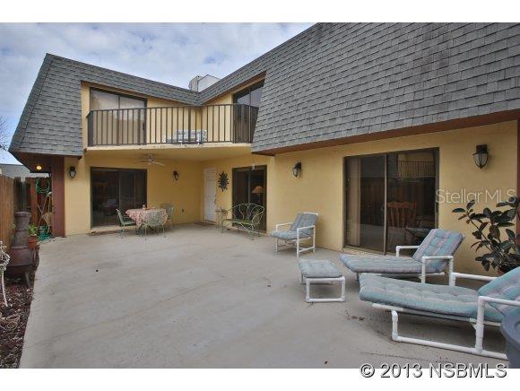Spacious 3-bedroom 2-1/2 bath townhouse just steps to the beach! Family will love this large kitchen with breakfast bar and huge dining area. Cozy living room w/gas fireplace overlooks large patio with chimenea perfect for outdoor living! Large bdrm down also has view of and entrance to patio. Relax at the end of the day in the huge Master Suite with peaceful views from the upstairs balcony There is a wall of closets in the master and storage galore throughout this home. The 2nd upstairs bedroom is also spacious and overlooks patio. The home is tiled thru out, has a new AC in 2012, and new roof in 2003. Don't miss this opportunity to own a large home on beachside at this amazing price! ;Water: City