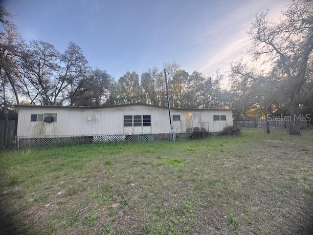Owner Is Ready To Sell and Ready To Negotiate!! Price Improvement in Place! Enjoy country living with the convenience of town nearby! This fixer-upper sits on over ½ acre of cleared, fenced land with beautiful mature trees. The property includes a vintage single-wide home and offers plenty of potential for renovation, replacement, or future improvements.  Equipped with a private well and septic, this property is ideally located near the Withlacoochee State Forest, perfect for nature lovers and outdoor enthusiasts. Convenient access to Hwy 50/Cortez Blvd, Hwy 301, I-75, and the Florida Turnpike makes commuting easy.  You’re just minutes from shopping, dining, community events, and the popular Webster Flea Market, and centrally located between Tampa and Orlando. Plus, enjoy being within 45 minutes to an hour of Florida’s beautiful beaches and natural springs. A great opportunity for those seeking space, location, and potential! This property is currently tenant occupied.  The opportunity to keep it an income property with a seasoned tenant. The possibilities for this property are endless. This Owner has additional properties that are available and will consider selling all together for one price. All properties are income rental properties.