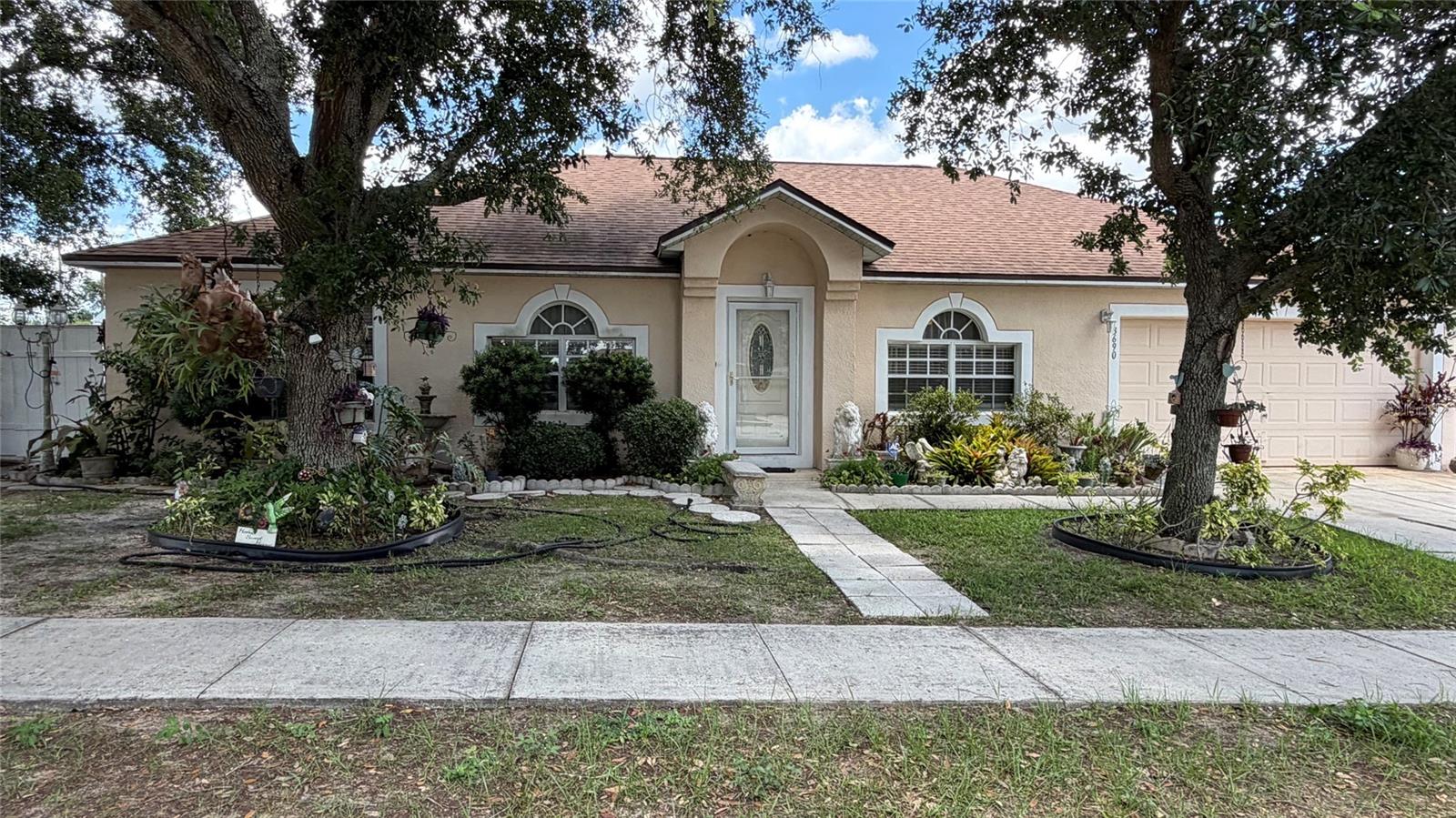 This isn't just a home —it's a property designed for those who dream bigger. Live comfortably, generate income, and create a future filled with possibilities at 3690 Wellington Place. Where space, flexibility, and opportunity come together just off Highway 60 on the outskirts of Bartow. Nestled in a community with a low HOA, this one-of-a-kind property offers the perfect blend of comfortable living and exceptional income potential.

The main residence features 2 bedrooms and 1 bathroom, designed with both everyday living and entertaining in mind. At the heart of the home is an oversized kitchen with a large center island, abundant cabinetry, and plenty of prep space—ideal for hosting family gatherings or casual meals. Formal living and dining rooms provide additional room to relax, entertain, or create dedicated spaces to fit your lifestyle.

Retreat to the generous primary suite, complete with a spacious en-suite bathroom featuring a garden tub, separate walk-in shower, and plenty of room to unwind.

What truly sets this property apart are the two attached one-bedroom, one-bath efficiencies, offering incredible versatility and it's one private entrance. Whether you're looking to generate rental income, create private guest accommodations, house extended family, or launch a room-rental business, these additional living spaces open the door to endless possibilities.

Outside, you'll find an oversized backyard with room to garden, entertain, or simply enjoy the outdoors, along with additional storage space for tools, equipment, and seasonal items.

Conveniently located with easy access to Highway 60 while offering a peaceful setting just outside the city, this unique property presents an opportunity that's hard to find. The best investments don't always look like investments. Sometimes they look like home. Welcome to 3690 Wellington Place—where everyday living meets extraordinary opportunity.

Schedule your private showing today and discover all the possibilities.