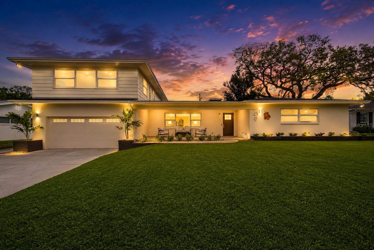 MAJOR PRICE REPOSITIONING — NOW OFFERED AT $999,900! ONE OF FAIRWAY ESTATES’ LARGEST HOMES - FULL REMODEL, PRICED UNDER $1M AND UNDER $300/SQ FT.

MID-CENTURY CHARACTER MEETS MODERN COASTAL DESIGN This fully re-imagined Fairway Estates residence is nearly 3,500 sq ft of move-in-ready living space. This is not a typical-sized home for Fairway Estates. Based on recent neighborhood sales, this home is nearly double the size of the average home sold — an outstanding value opportunity in one of Dunedin’s most desirable golf-cart-friendly neighborhoods.

Completely renovated and thoughtfully redesigned, with a modern open floorplan, This is not a small cosmetic refresh. The home has been rebuilt from the inside out with all-new electrical, a complete rewire, new HVAC system, new roof, impact-rated double-pane windows, and a freshly painted exterior, delivering the comfort, efficiency, and long-term peace of mind buyers expect in a fully renovated home.

This 4-bedroom, 4.5-bath home blends classic Florida architecture with a fresh modern flow, just minutes from Downtown Dunedin, the beaches, the Pinellas Trail, Dunedin Causeway, Honeymoon Island, and the historic Dunedin Golf Club. From here, you are golf-cart distance to Downtown Dunedin, walking distance to the Pinellas Trail, and just a short drive to the beaches.

Beautifully restored stunning polished terrazzo floors run throughout the first floor, adding warmth, texture, and authentic mid-century appeal. The heart of the home is the open chef’s kitchen, featuring quartz countertops, solid wood cabinetry, and a layout designed for everyday living, entertaining, and gathering.

Each bedroom features its own private ensuite bathroom, creating a functional layout for family, guests. One of the home’s most valuable features is the expansive secondary living area, currently configured as a private guest or in-law suite with its own full kitchen, laundry, living space, and separate entrance potential. This flexible space could also serve beautifully as a game room, media lounge, private retreat, art studio, or extended family quarters.

An additional 360-square-foot bonus living area adds even more usable lifestyle space, finished with new luxury vinyl plank flooring and filled with natural light. From the oversized two-car garage to the large covered front porch finished with elegant linen tile, the home offers space, function, and presence rarely found in this neighborhood at this price point.

The fully fenced backyard with new vinyl privacy fencing offers excellent potential for a future private outdoor retreat. Renderings help show the potential for a resort-style screened lanai, pool, travertine deck, and outdoor kitchen.

Located in Zone X and a non-evacuation zone, this home offers added peace of mind while keeping buyers close to the best of coastal Dunedin living. Fairway Estates is one of Dunedin’s most loved neighborhoods, ideally positioned near the restored Dunedin Golf Club, Highland House, the Pinellas Trail, Dunedin Causeway, Honeymoon Island State Park, waterfront restaurants, breweries, festivals, boutiques, farmers markets, and Downtown Dunedin.

At $999,900, this is a rare opportunity to own one of Fairway Estates’ largest fully renovated homes!