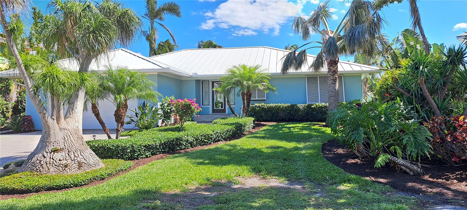 Under contract-accepting backup offers. Island living at it’s best, in this charming Waterfront cottage located on a quiet street in the heart of Boca Grande! 3 bedrooms and 2 baths, a pool, dockage and 10,000 lb. lift!  You can walk or bike to the village from this highly sought after location.  Lounge by the pool and enjoy watching the Manatee in the canal, or hop in the boat for easy access to Charlotte Harbor, and the Gulf of Mexico!  Day trips to Cabbage Key, Tarpon Lodge and our surrounding islands is easy! Boca Grande is known for its beautiful beaches, world class fishing, quiet tree lined streets, excellent restaurants, and quaint neighborhoods.  This location has the best access to it all!