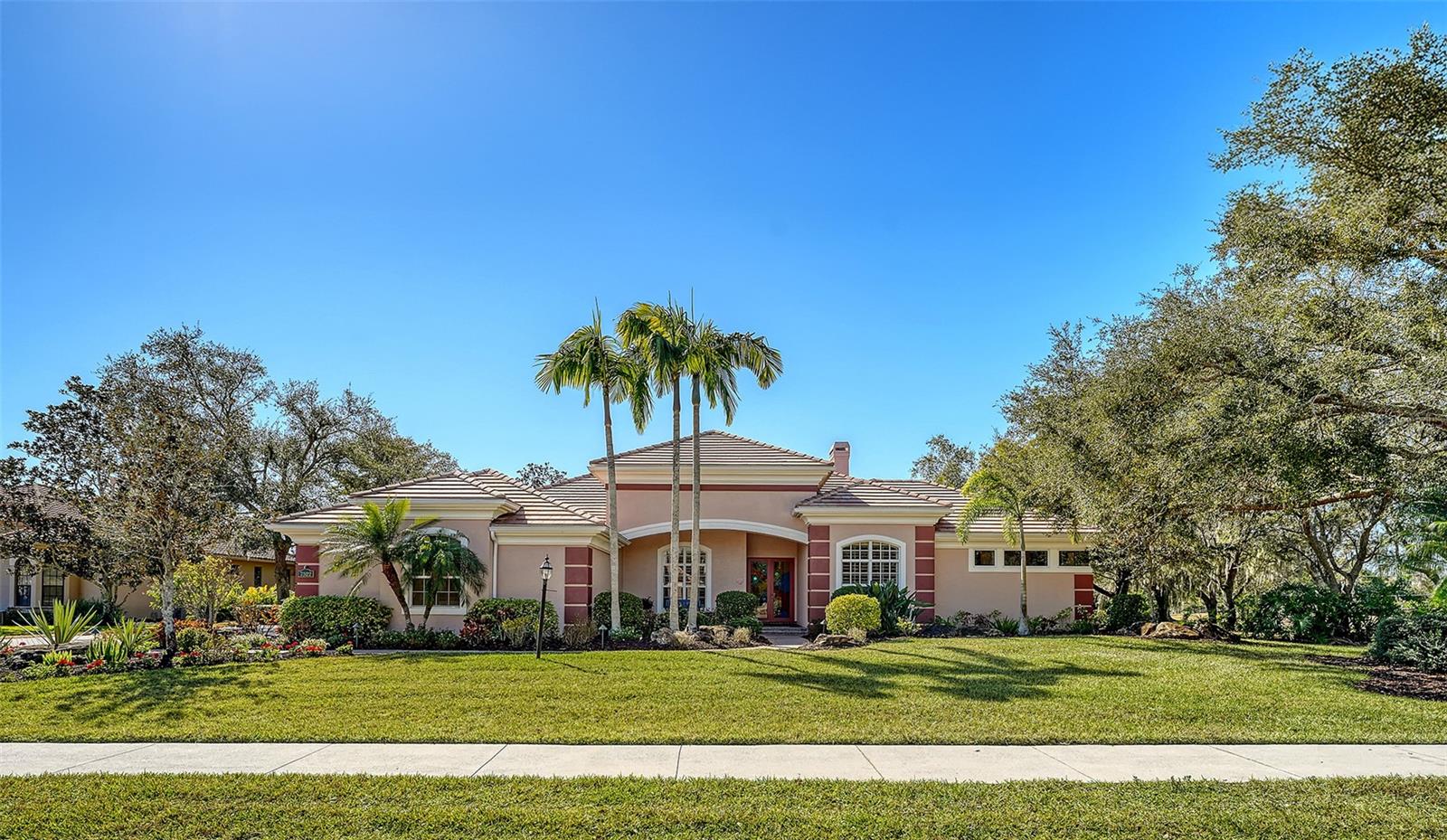 This Preserve at Heron Lake Estate Home was built by Arthur Rutenberg in 2008 by the owners. Pride of ownership abounds. On a ¾-acre corner lot with four bedrooms, 3 ½ baths, the split floor plan offers plenty of space to spread out and live large! The home has an open kitchen/family room, bar area, walk-in pantry and eat-in dining area with an aquarium window looking out onto the saltwater pool and spa, complete with travertine decking. A formal dining room, living room with fireplace and family room that opens out to the pool deck with triple sliding doors that pocket, creating indoor/outdoor living. The kitchen has a Viking cooktop, GE Profile appliances, double convection ovens, built-in microwave and a double drawer under-island refrigerator. The owner’s suite is something to behold with sitting area space, large dual custom closets, owners bath with tub and Roman walk-in shower, dual vanity sink areas and private water closet. New luxury vinyl plank in owner’s suite and Jack and Jill bedrooms. Custom closets, soft-close custom cabinetry and custom lighting throughout, wood plantation shutter window treatments. Four-tray ceilings with Venetian plaster. Entire exterior painted in 2023. Leaf Guard gutter system. Zoned for three AC. Garage has built-in cabinetry and air conditioner has been added. Owners customized the three-car garage, a closet in the owner's suite and the formal dining area, all are larger than original floor plan.