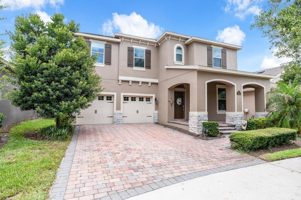 Welcome to this beautifully updated and exceptionally spacious 5-bedroom home located in one of the most desirable sections of Waterleigh’s original phase in Winter Garden.

From the moment you enter, you are welcomed by a dedicated formal dining room, creating an inviting space for entertaining and special gatherings. The open-concept kitchen flows seamlessly into the main living area and breakfast nook, offering a bright, functional, and comfortable layout designed for everyday living.

The first floor also features a versatile bedroom that can easily be used as a private home office, guest room, playroom, or flex space. Brand-new porcelain tile flooring throughout the main level adds a clean and modern touch, while the elegant wood staircase creates a beautiful transition to the second floor.

Upstairs, an impressive oversized loft provides the perfect space for a media room, game room, second family room. The thoughtfully designed upper level includes two spacious en-suite bedrooms, providing privacy and comfort, along with two additional bedrooms that share a well-positioned bathroom. The entire second floor features durable and stylish vinyl flooring.

Step outside to the screened-in lanai with finished flooring, an ideal setting for relaxing, dining, and enjoying Florida’s year-round sunshine. The large, fully fenced backyard offers plenty of room for entertaining, pets, play areas, or even the possibility of creating your own private outdoor retreat.

Waterleigh is known for its outstanding resort-style amenities, including community pools, fitness centers, clubhouses, a navigable lake, dock, beach volleyball court, playgrounds, walking trails, and beautifully maintained outdoor spaces.

Ideally located in Winter Garden, close to shopping, dining, major highways, world-famous attractions, and highly rated schools, this home offers the perfect combination of space, comfort, modern updates, an excellent floor plan, and an exceptional community lifestyle. A wonderful opportunity to own a move-in-ready home in one of the area’s most sought-after communities.