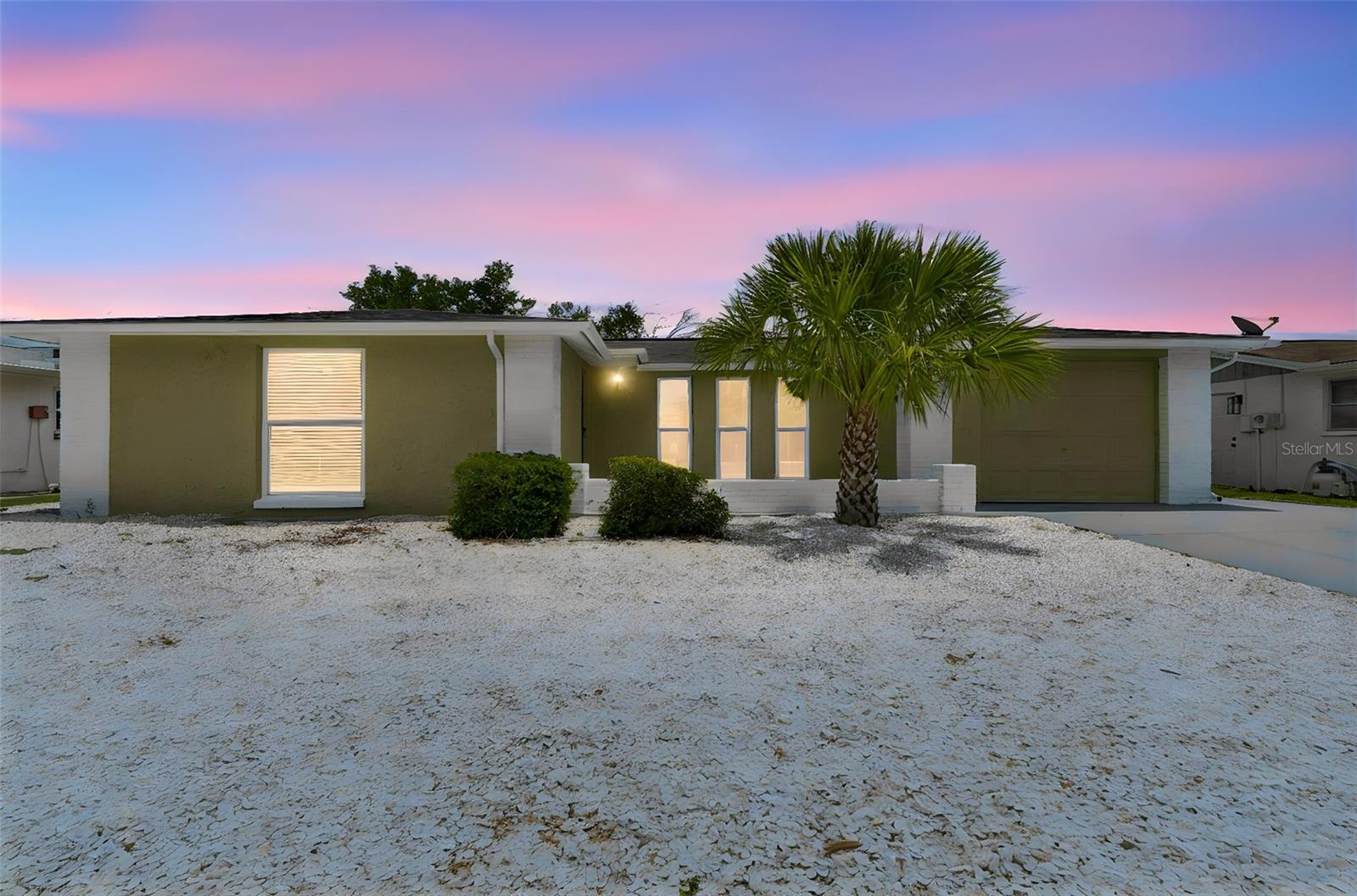 One or more photo(s) has been virtually staged. Welcome to 11130 Tamarix Avenue, a beautifully remodeled and move-in-ready home offering the perfect blend of modern updates and comfortable Florida living. This thoughtfully updated 2-bedroom, 2-bathroom residence features 1,440 heated square feet of living space, a versatile bonus room, and a 1-car garage.

Step inside to discover bright and inviting living areas enhanced by fresh interior paint, abundant natural light, and stylish new flooring throughout. The updated kitchen is sure to impress with brand-new cabinetry, elegant quartz countertops, and a full suite of new appliances, including a range, microwave, refrigerator, and dishwasher. New ceiling fans, fixtures, and fresh exterior paint further elevate the home's appeal.

Designed with both comfort and flexibility in mind, the spacious bonus room can easily serve as a home office, den, hobby room, fitness area, or additional living space to fit your needs. The primary suite provides a private retreat, while the second bedroom and bathroom provide comfortable accommodations for family and guests.

Major improvements provide peace of mind for years to come, including a brand-new roof, new air conditioning system, and a water heater replaced in 2018. Outside, the newly installed privacy fence creates an ideal space for relaxing, entertaining, gardening, or enjoying the Florida sunshine.

Conveniently located near shopping, dining, parks, medical facilities, and major roadways, this turnkey property provides easy access to everything the Port Richey area has to provide. Whether you're a first-time homebuyer, seasonal resident, or looking to downsize without sacrificing comfort, this beautifully renovated home is ready for its next owner. Schedule your private showing today!