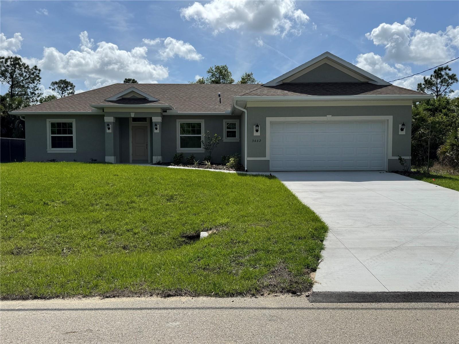 MOVE IN READY!!  NEW CONSTRUCTION!!  This home features an open concept kitchen/great room combo.  Featuring solid wood, soft close cabinets and granite countertops.  An island rounds off the kitchen area.  The great room has sliders that open to the back yard. The primary bedroom is spacious with a generous size walk in closet,  The primary bathroom has a walk in shower , garden tub and dual sinks.  The split floor plan is complimented by 2 more bedrooms with hall and the second bathroom.  There is also a separate laundry room between the kitchen and 2 car garage.