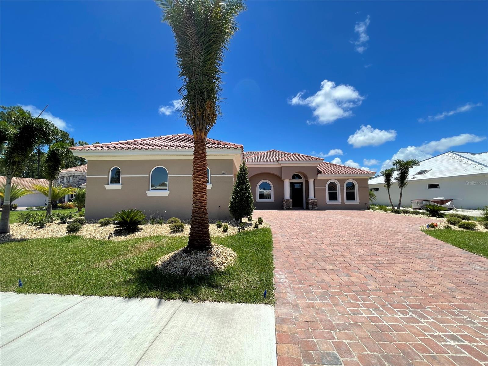 New Construction home in Portofino Gardens at Venetian Bay with the Barcelona III floor plan.  This is a 3 bedroom, 3 bath home featuring a 3 car garage and a large lanai with a view of the pond.  The large kitchen features a walk-in pantry and a breakfast nook. ;Water: City