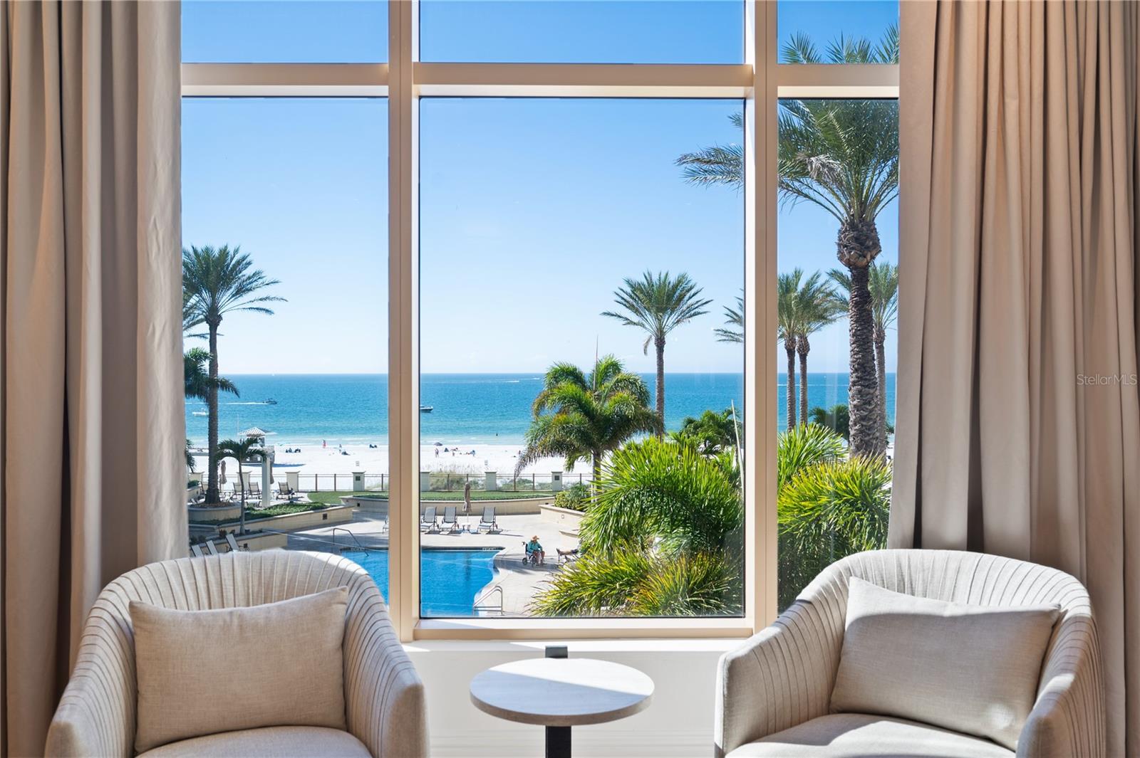 Welcome to the Residence at the Sandpearl Resort; the Gem of Clearwater Beach. This top-floor penthouse in the highly sought-after twelve-unit boutique building had a designer-inspired remodel conducted in late 2023. Units in this building do not often become available, making this a rare opportunity to reside in one of the most luxurious, private, and exclusive buildings on any of the Bay Beaches. This designer-inspired remodel comes FULLY FURNISHED, with a collection of incredible art commissioned specifically for the unit, making it feel like you’re living in the pages of a luxury living magazine. With two spacious bedrooms and a nicely appointed bonus room, there is enough space to sleep six comfortably. With the boutique building’s elevator opening directly onto Mandalay Ave, you’re only steps away from some of the best restaurants and attractions the area offers. Come see why so many flock to Clearwater Beach every year, and don’t miss this once-in-a-lifetime opportunity to own this beautiful top-floor unit at the Residence at the Sandpearl Resort. This community offers a 24/7 concierge service and long list of both resort AND resident amenities. Book your private showing today!