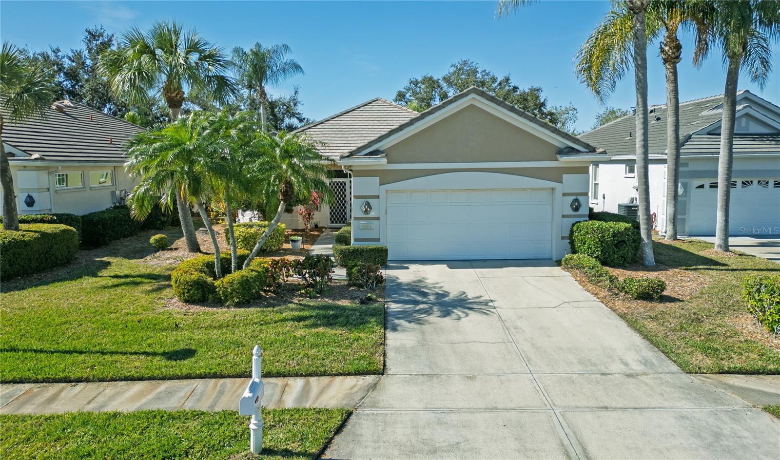 Welcome to this beautifully maintained home, built in 1996, offering 1,886 sq. ft. of comfortable living space in the desirable Peridia Country Club community. This 3-bedroom, 2-bathroom home features a split open floor plan with vaulted ceilings, creating a bright and airy atmosphere throughout. The spacious kitchen includes granite countertops, greater counter space and plentiful cabinetry; all appliances are included. A cozy breakfast nook just off the kitchen provides an ideal space for casual dining or morning coffee, perfect for both everyday living and entertaining. The home showcases a concrete tile roof, a newer AC, sturdy vinyl and ceramic tile flooring, a two-car garage, and a laundry room with washer and dryer for added convenience. Step outside and enjoy peaceful golf course views within a resort-style community that features an 18-hole golf course, heated pool and lounge area; tennis and pickleball courts; poolside tiki bar and an on-site restaurant. This home perfectly blends comfort, space, and community amenities, offering the best of country club living and opportunities to build lasting friendships. Nonetheless, affordable country-club living: Master Association (Peridia Property Association): $312.66/month includes access to all amenities and country club facilities; Peridia Homeowners Association: $156.66/month covers yard maintenance; annual food & beverage fee: $450; one-time capital contribution (supports community amenities): $4,000; golf membership is optional, pay-as-you-play; pet & leasing are  allowed. No age restrictions, No CDD, No flood zone. This house is financed by VA loan, and it is transfarable.