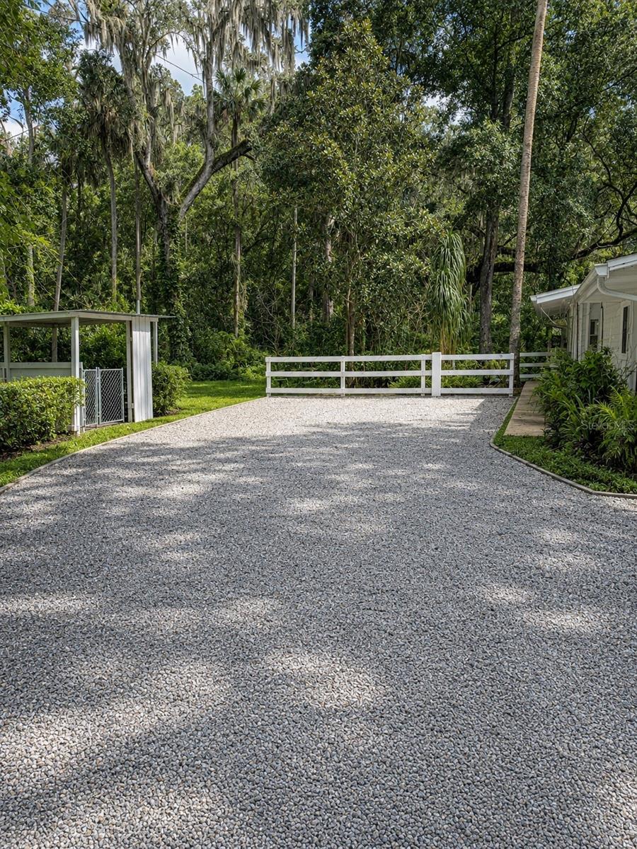 Welcome to 1735 Timocuan Way, Longwood, Florida 32750—a charming and private one-bedroom, one-bath residence surrounded by beautiful mature trees and lush natural scenery.

The home features a spacious and inviting living room, a comfortable bedroom, a full bathroom, and a bright eat-in kitchen with space for everyday dining. The open layout creates a relaxed and welcoming atmosphere, while large windows bring in natural light and peaceful views of the surrounding greenery.

Step outside and enjoy the home’s open-air deck and covered rear porch, ideal for morning coffee, outdoor dining, grilling, entertaining, or simply relaxing in the quiet wooded setting. Walking distance to Historic Big-tree Park.

Accessed by a private road, the property offers a wonderful sense of seclusion and exclusivity while remaining conveniently located near Lake Mary and Longwood’s shopping, dining, transportation, and everyday amenities. Approximately 10 minutes from the the Sanford International Airport and walking distance from Railroad station. Close to Seminole college

This unique home is perfect for someone seeking a peaceful retreat with privacy, character, and comfortable indoor-outdoor living in a beautiful natural environment.

Private, tranquil, and surrounded by nature—this is a rare opportunity to enjoy relaxed Longwood living.

Virtual staging is shown in selected photographs. Furniture and decorative items are not included.