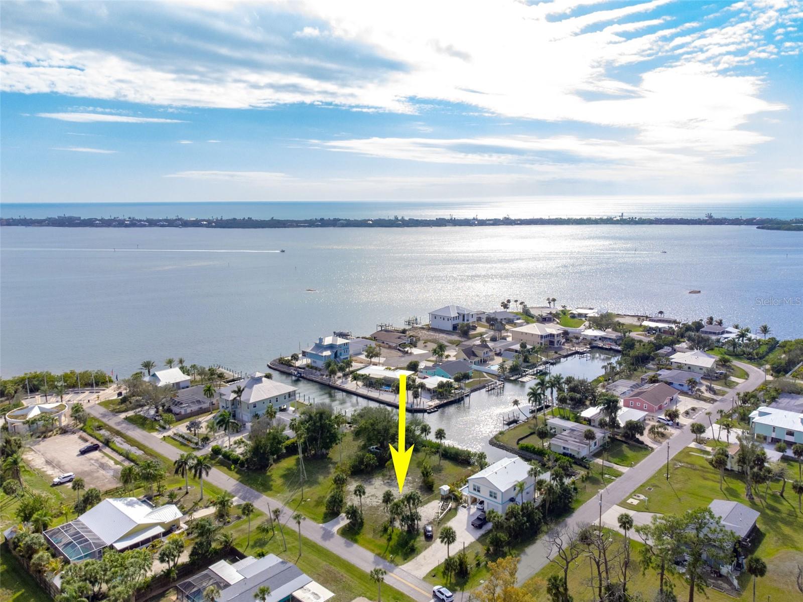 Unveil the ultimate canvas for your coastal dream home at 46 Harbor Lane, a premier waterfront property situated in the heart of the highly desirable Old Englewood neighborhood. This oversized lot provides a rare and immediate opportunity to design a custom architectural masterpiece from the ground up. The location is a true boater’s paradise, positioned just three houses away from the wide-open waters of Lemon Bay, ensuring lightning-fast access to the Intracoastal Waterway and the Gulf of Mexico.
The property comes equipped with a high-quality dock installed in 2016, providing a secure and ready-made slip for your vessel so you can start enjoying the water from day one. Whether you are launching for a day of world-class fishing or a sunset cruise, this sturdy infrastructure serves as the perfect gateway to the Florida lifestyle. Nestled within a quiet enclave known for its charming Old Florida character, you are just minutes away from the historic boutiques and vibrant dining of Dearborn Street.
This property represents a prime building opportunity to create a high-elevation sanctuary where an elevated build will reward you with panoramic views of the Bay and refreshing salt breezes. Whether you envision a sleek modern estate or a classic coastal retreat, this extraordinary waterfront location offers the space, the infrastructure, and the freedom to build the lifestyle you’ve always imagined.