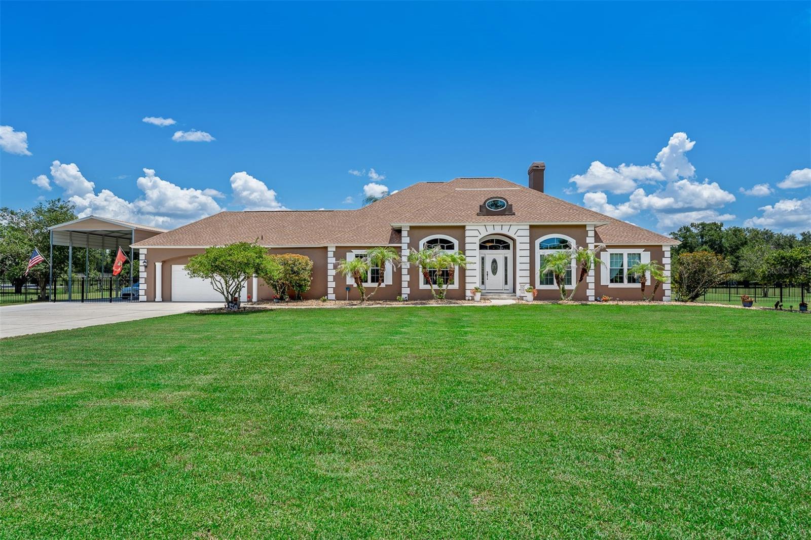 Private Luxury Estate. Endless Possibilities.

Experience the rare opportunity to own a private estate offering over 2 beautifully manicured acres, zoned for horses, deeded access to Lake Mabel, just minutes from Walt Disney World and Central Florida’s premier attractions. Combining luxury, space, and lifestyle, this exceptional 4-bedroom, 3-bath residence is a true retreat with room to live, entertain, and explore. Located so close to Disney that you can watch the fireworks every night from your own yard.

Designed for both comfort and elegance, the home features an open, light-filled floor plan with soaring ceilings, rich finishes, granite countertops, and a spacious gourmet kitchen equipped with stainless steel appliances. The seamless flow between indoor and outdoor living creates the perfect setting for entertaining family and guests.

Step outside to your own tropical paradise featuring a sparkling screened pool surrounded by lush landscaping and expansive views of the estate. Enjoy the privacy of country living while remaining close to world-class dining, shopping, golf, entertainment, and Orlando International Airport.

Equestrian enthusiasts will appreciate the horse zoning, while outdoor lovers will enjoy deeded access to Lake Mable, providing opportunities for recreation just moments from home.

Additional premium features include:



New roof,
New air conditioning system,
Stainless steel Frigidaire appliance package,
Granite countertops,
Two-car attached garage,
Detached garage/workshop,
RV carport with ample space for boats, trailers, and recreational vehicles,
Low HOA Fees.