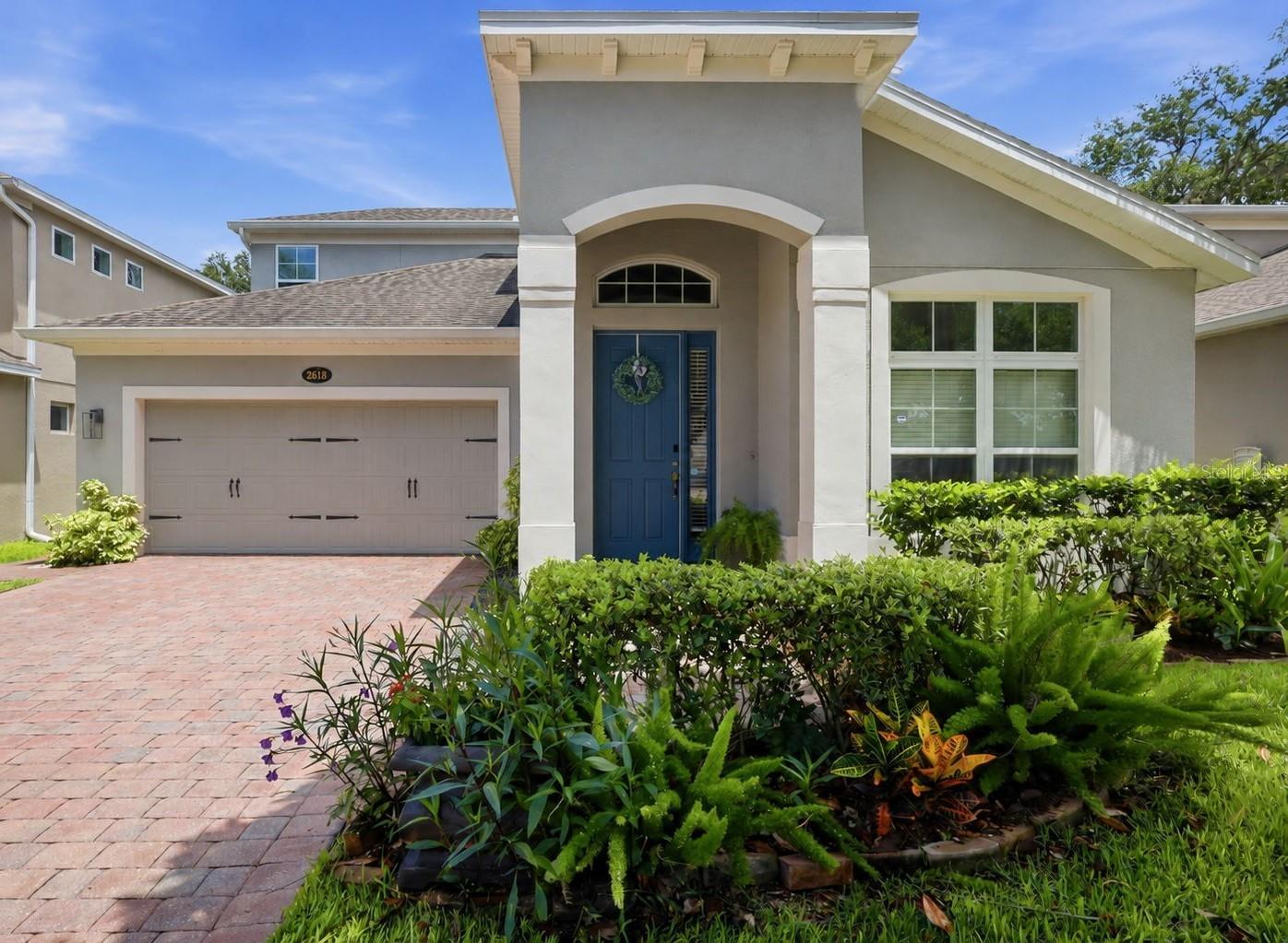 Welcome to this beautifully maintained, Move-in-Ready, 4-bedroom, 2.5-bath, two-story home located on a quiet cul-de-sac in the gated community of Aulins Landing in Oviedo. This spacious floor plan features an oversized primary suite conveniently located on the first floor, overlooking the backyard. The primary retreat includes wood laminate flooring in the bedroom and wood plank tile in the bathroom.  There are two large walk-in closets, including a custom-designed closet system installed in 2023.  The huge, primary bathroom has a glass-enclosed walk-in shower, sunken tub, two separate vanities, and a private water closet.

The gourmet kitchen is equipped with stainless steel appliances, an oversized, granite-topped island and a large walk-in pantry.  There is an eat-in kitchen area that opens up to the large, living room where you will find sliding glass doors that leads out into the screened-in porch overlooking the fully fenced backyard with white, vinyl fencing and an additional paver patio area perfect for outdoor entertaining. 

Additional rooms downstairs include an elegant, separate dining room providing additional space for gatherings, a half bath and the spacious laundry room which includes, storage cabinets, and a quartz countertop folding area.  The new washer and dryer (2025) convey with the home too!

Upstairs, you'll find three additional bedrooms, a full bathroom with a shower/tub combo, and an extra-large bonus room offering endless possibilities for a media room, playroom, home office, or flex space.  New carpet was just installed in May 2026 in the entire upstairs.
Additional features of the home include a two-car garage that is pre-wired for a 240v 60amp EV charging station, a paver driveway with ample parking, and attractive wood plank flooring that extends throughou the main living areas downstairs.

Residents of Aulins Landing enjoy a neighborhood playground and a close-knit community known for its pride of ownership and beautifully maintained homes. Conveniently located near shopping, dining, major roadways, and top-rated Seminole County schools.  Don't miss this exceptional opportunity to own a move-in-ready home with just over 3,000sq ft in one of Oviedo's most desirable gated communities.  Come see it for yourself!