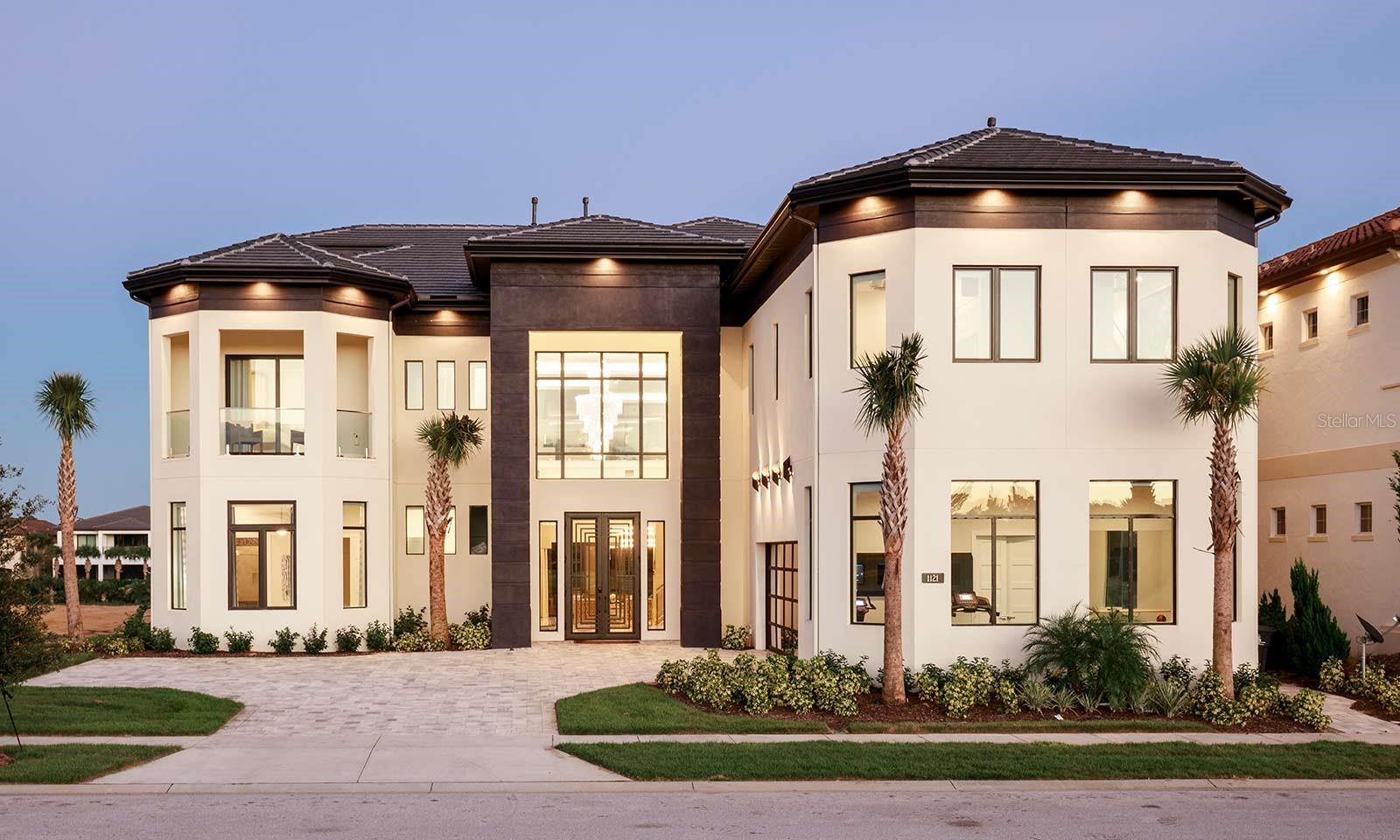 Perfectly Priced High-End Vacation Home in the Upscale Estates neighborhood of Reunion Resort & Club.  Don't miss the 3D virtual tour to see the entire home as if you were there.  The Estates features the largest homes in what's become the best short term rental community in the country Reunion Resort.  This CUSTOM 9-bedroom, 3-story, mansion preforms year after year as one of the highest grossing Short Term Rentals in Orlando.  It's easy to see why once you view all the luxurious amenities, sleeping quarters and living spaces spread across 10,000 square feet.  Upon entering the home your eyes will be draw to the elegant fixtures and high gloss tile giving the home and ultra modern feel.  The professionally decorated main living area opens on to the spacious kitchen and dining room both overlooking the outdoor oasis. Featuring private pool and gorgeous patio with its loungers, roomy summer kitchen, bar, firepit, fully-screened lanai, and views of the 6th hole on the Jack Nicklaus Signature Golf Course.  There is also a one-of-a-kind games room that will entertain everyone with karaoke, skeeball, basketball, air hockey, bowling, and golden tee.  The second floor offers a billiard room with full bar and outer-space themed theater.  Located on the other side of the second floor is two out of this world bunk rooms with Star Wars & Toy Story theming as well as a separate play area that offers Mario kart, gaming consoles, foosball & authentic diner to sit and view all the fun.  Make your way up to the private sanctuary on the 3rd floor where you'll find the main master suite with spa like shower/tub and bright office for some quiet time.  The home has a transferable Reunion Resort Club Membership and plenty of future bookings that can convey seamlessly to the new owner.  Reunion Resort offers 3 Championship Golf Course, Waterpark, Tennis/Pickle-ball complex, and loads of community events.  Call today to schedule your own private showing of your next investment home!