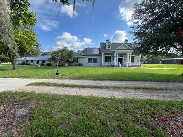 UNMATCHED EQUESTRIAN & WATERFRONT ESTATE ON 10 ACRES | MINUTES TO MOUNT DORA.
Welcome to a one-of-a-kind, 10-acre private paradise that seamlessly combines equestrian excellence, direct waterfront living, and massive income potential! Tucked away in a tranquil setting yet just minutes from vibrant Downtown Eustis and historic Mount Dora, this trophy property offers flexibility and amenities rarely seen in Lake County.

THE MAIN RESIDENCE | Multi-Generational Living & Ultimate Flexibility
Spacious Living: Impressive 4,493 sq. ft. under air (6,300 total sq. ft.) featuring expansive living areas and timeless charm.

Dual-Living Design: Seamlessly engineered with the easy capability to be divided into 2 separate, fully functional residences while remaining connected—ideal for multi-generational families, live-in staff, or guest quarters.

Modern Upgrades & Peace of Mind:

Brand-New Roof (2023)

Whole-House Solar System for massive energy savings

Two BRAND-NEW 4-Ton AC Units plus a third unit (only 4 years old) ensuring maximum efficiency year-round.

EQUESTRIAN FACILITIES | Pasture, Privacy & Space to Grow
New Grand Barn (90x50): High-capacity barn capable of housing up to 12 stalls—perfect for training, boarding, or private collections.

Historic 4-Stall Barn: A charming, 50-year-old historic barn offering authentic character and functional storage or turnout space.

Arena Ready: Expansive, cleared 10-acre footprint provides ample flat space to build your custom equestrian arena, paddocks, or jump course.

CLEAR LAKE WATERFRONT | Your Private Oasis
Nestled directly on Clear Lake, a pristine, spring-fed body of water:

Private Dock & Sandy Beach: Step straight out to soft sand or take the boat out for an afternoon on the water.

Lakeside Entertainment: Complete with a custom firepit, smoke shack, and unbeatable sunset views—the ultimate setup for hosting.

INCOME & RV AMENITIES | Guest Setup & Rental Potential
Newly Finished Cabin (600 sq. ft.): Move-in or rent-ready! Ideal for an Airbnb, long-term rental, caretaker quarters, or private home office/studio.

5 RV Hookup Sites:

1 Covered RV Spot

3 Sites fully equipped with Water, Electric, and Sewage

Perfect for visiting equestrian clients, seasonal guests, or additional passive income.

Properties offering this combination of acreage, direct spring-fed waterfront, multi-family potential, equestrian infrastructure, and rental income—all within minutes of Mount Dora—are virtually unheard of. Schedule your private tour today to experience this magnificent estate firsthand!