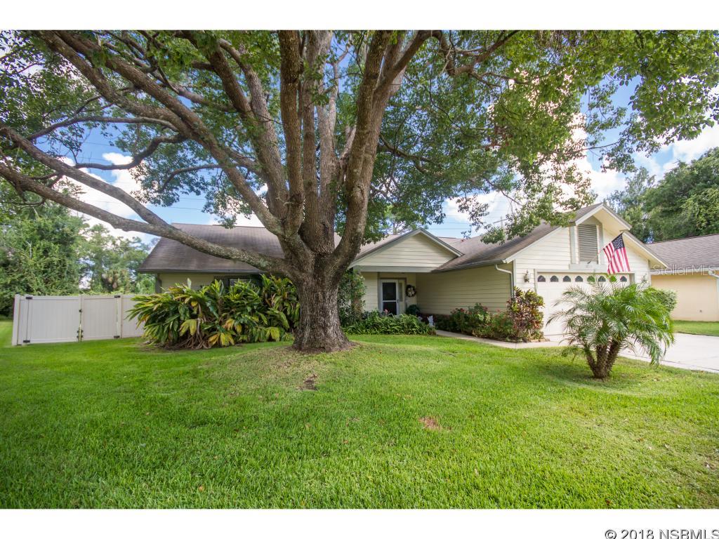 Lovingly maintained concrete block home with inground salt water pool and screened enclosure on a beautiful oversized lot with lush tropical vegetation. Situated in Countrywide Subdivision which is close to Dunlawton and all of the shopping and restaurants you need nearby. This home offers an open floor plan, a breakfast nook and a shaded patio overlooking the pool and back yard. The are upgraded upgraded light fixtures throughout. ;Water: City