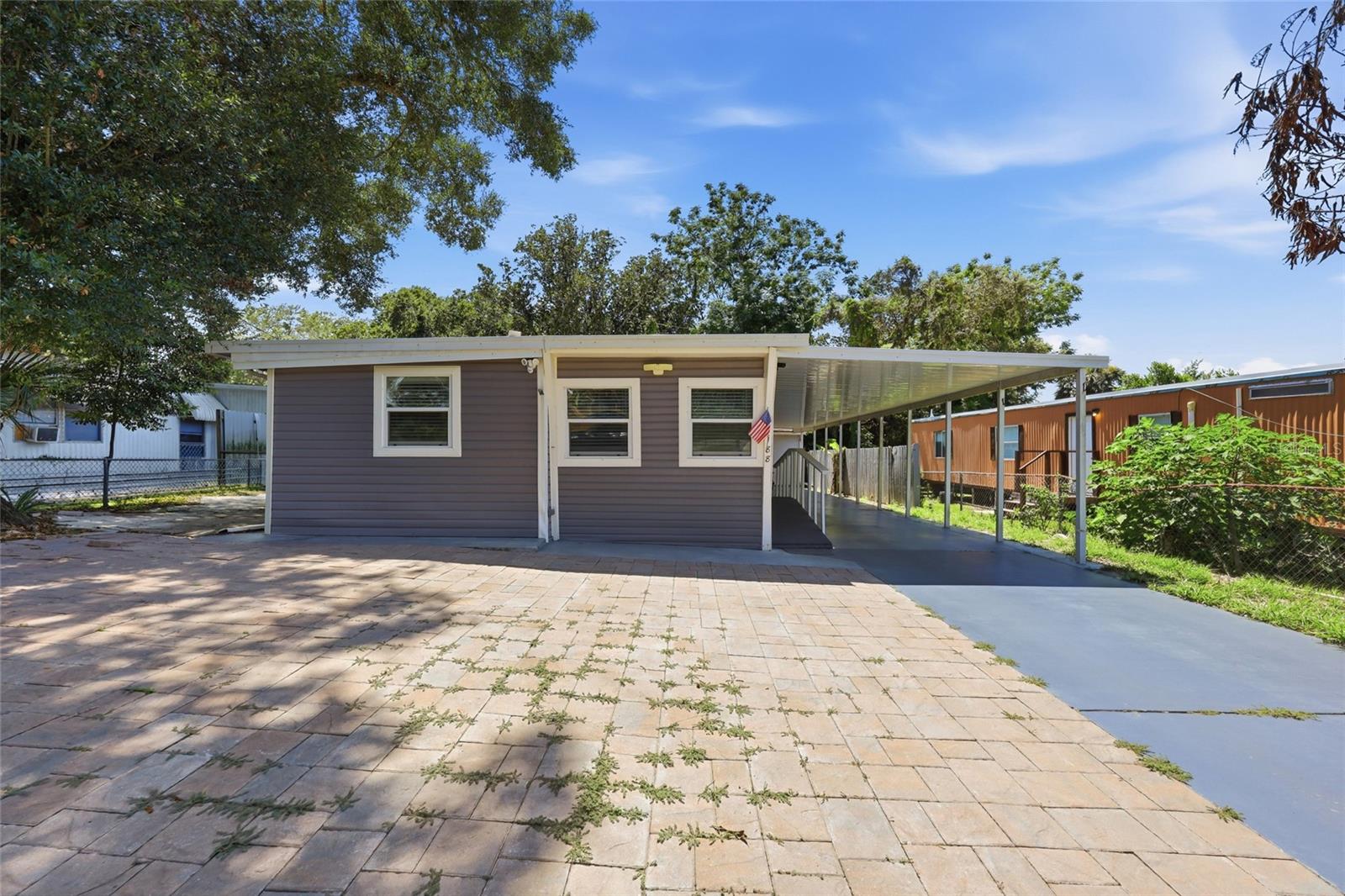 Don't miss this rare opportunity to own a unique property in a great location! Located less than 3 miles from Wekiwa Springs State Park, you'll enjoy the perfect combination of convenience and outdoor adventure with shopping, dining, parks, and major roadways all just minutes away.

This property offers a versatile layout and features a DETACHED GUEST SUITE with its own bathroom, providing the perfect space for guests, a private home office, additional living space, or the potential for income-producing opportunities. The spacious FULLY FENCED yard offers endless room to entertain, relax, or create your own outdoor oasis, while the covered carport and oversized driveway provide plenty of parking.

Enjoy the freedom of NO HOA and the added benefit of being located in a NO FLOOD ZONE. Conveniently located within the highly sought-after Seminole County School district, this one-of-a-kind property is packed with potential and is ready for its next owner. Schedule your showing today before this opportunity is gone!