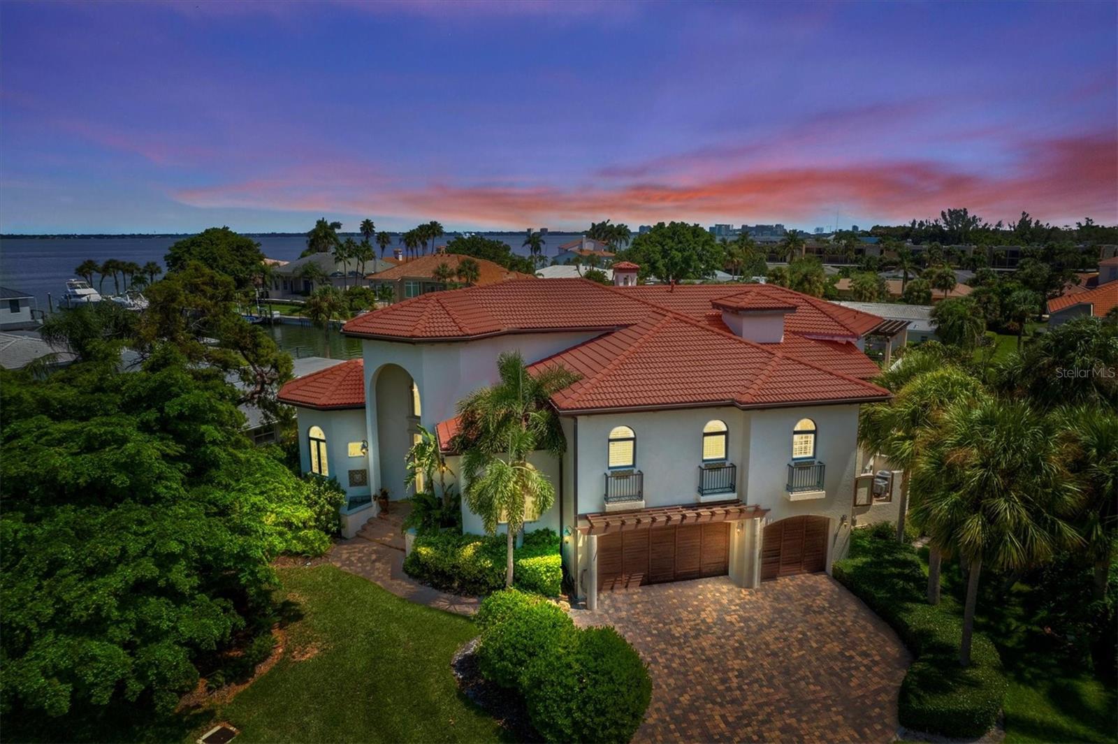 Significant price improvement on this beautifully maintained canal home in Country Club Shores, one of Longboat Key’s premier waterfront communities. This solid-block residence offers 4,438 sq. ft. of bright, open living with wide sailboat-water canal views and a layout ideal for full-time or seasonal living.

Enjoy a spacious chef’s kitchen, generous living areas, and comfortable bedroom suites. The outdoor space features a private pool, tropical landscaping, and a deep-water dock with quick access to Sarasota Bay and the Gulf.

Perfectly located near deeded beach access, the Longboat Key Club, the new St. Regis Longboat Key Resort, and the shops and dining of St. Armands Circle. Downtown Sarasota is minutes away, offering world-class arts and culture. A refined opportunity in one of Longboat Key’s most desirable neighborhoods.