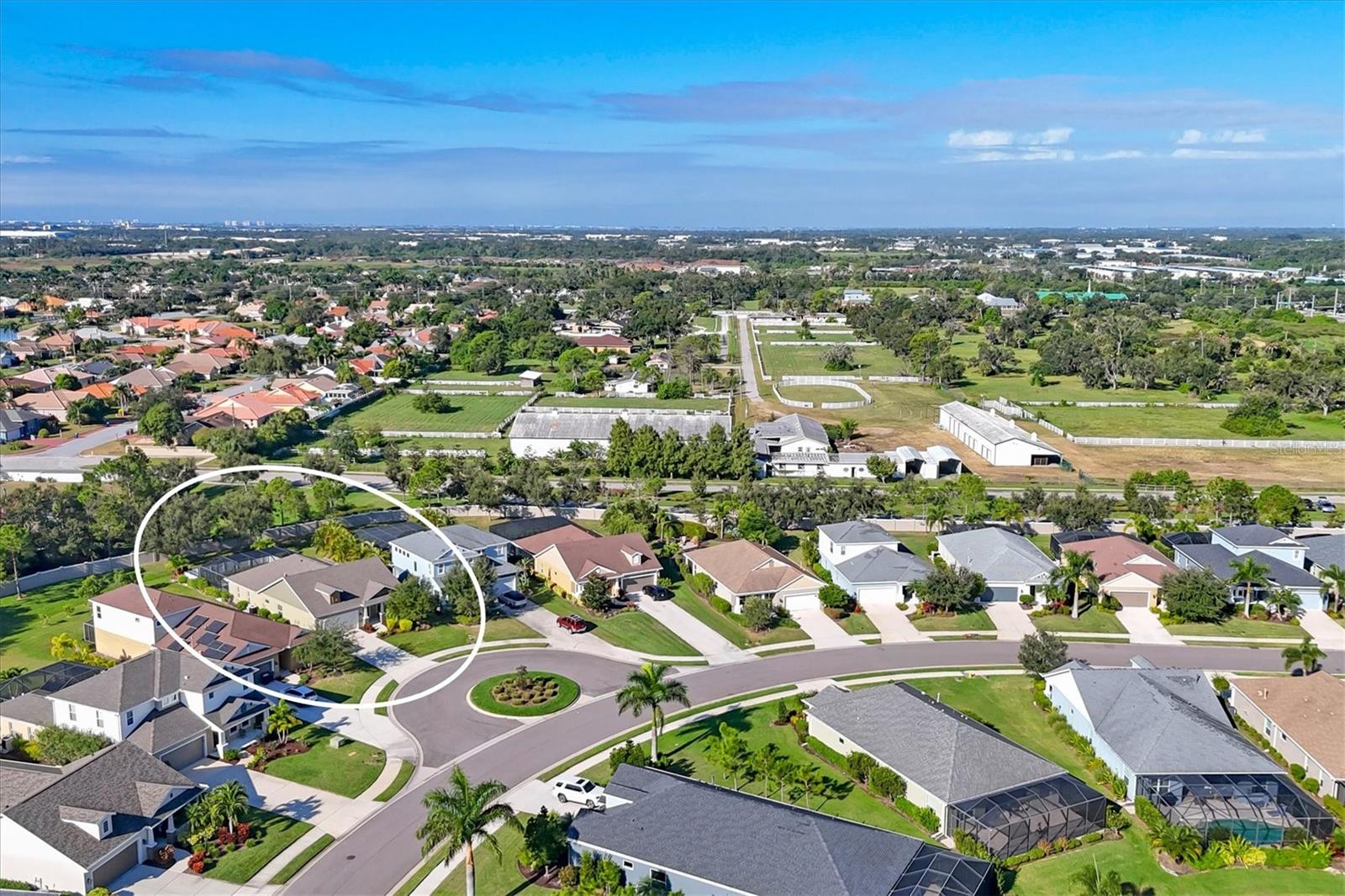 Virtually Staged. Welcome to this beautifully maintained 2016-built home in the gated community of Magnolia Point. Offering 3 bedrooms, 3 bathrooms, and 2,069 square feet, this move-in ready residence sits on a very private, manicured lot with thoughtful updates throughout. The open-concept floor plan features spacious living and dining areas, a well-appointed kitchen, and seamless indoor-outdoor flow to the screened lanai. Enjoy a heated pool with handicap accessibility features, ideal for year-round use. Recent improvements include a new roof (2023), pool and cage (2022), and exterior paint (2023), providing peace of mind for the next owner. Outdoor features include a large fenced dog run and access to community walking trails, offering both privacy and outdoor enjoyment. Conveniently located near shopping and dining, this home is approximately 5 miles to the Ringling Museum,  5 miles to SRQ Airport, 9 miles to Lido Beach, and just 8 miles to IMG Academy.