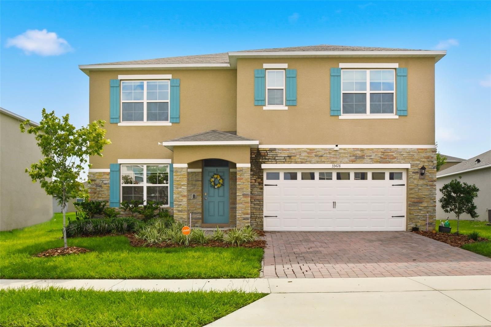 Welcome to this like-new 5-bedroom, 3-bathroom home, built in 2023, offering over 2,600 square feet of thoughtfully designed living space. The open-concept floor plan creates a seamless flow between the living, dining, and kitchen areas, making it ideal for both everyday living and entertaining. A dedicated office provides the perfect space to work from home or use as a flex room.

Upstairs, you'll find the spacious primary suite, three additional bedrooms, and a versatile loft that offers endless possibilities for a second living area, playroom, or media space. Downstairs features a private guest bedroom and full bathroom, ideal for visitors or multigenerational living.

Enjoy added peace of mind with a whole-home water filtration system, while the oversized backyard is fully enclosed with durable vinyl fencing, providing exceptional privacy and plenty of room to relax, entertain, or create your dream outdoor oasis.

Located in a desirable community with a pool and playground, this move-in-ready home combines modern design, functional living spaces, and fantastic neighborhood amenities. Don't miss your opportunity to make this beautiful home yours!