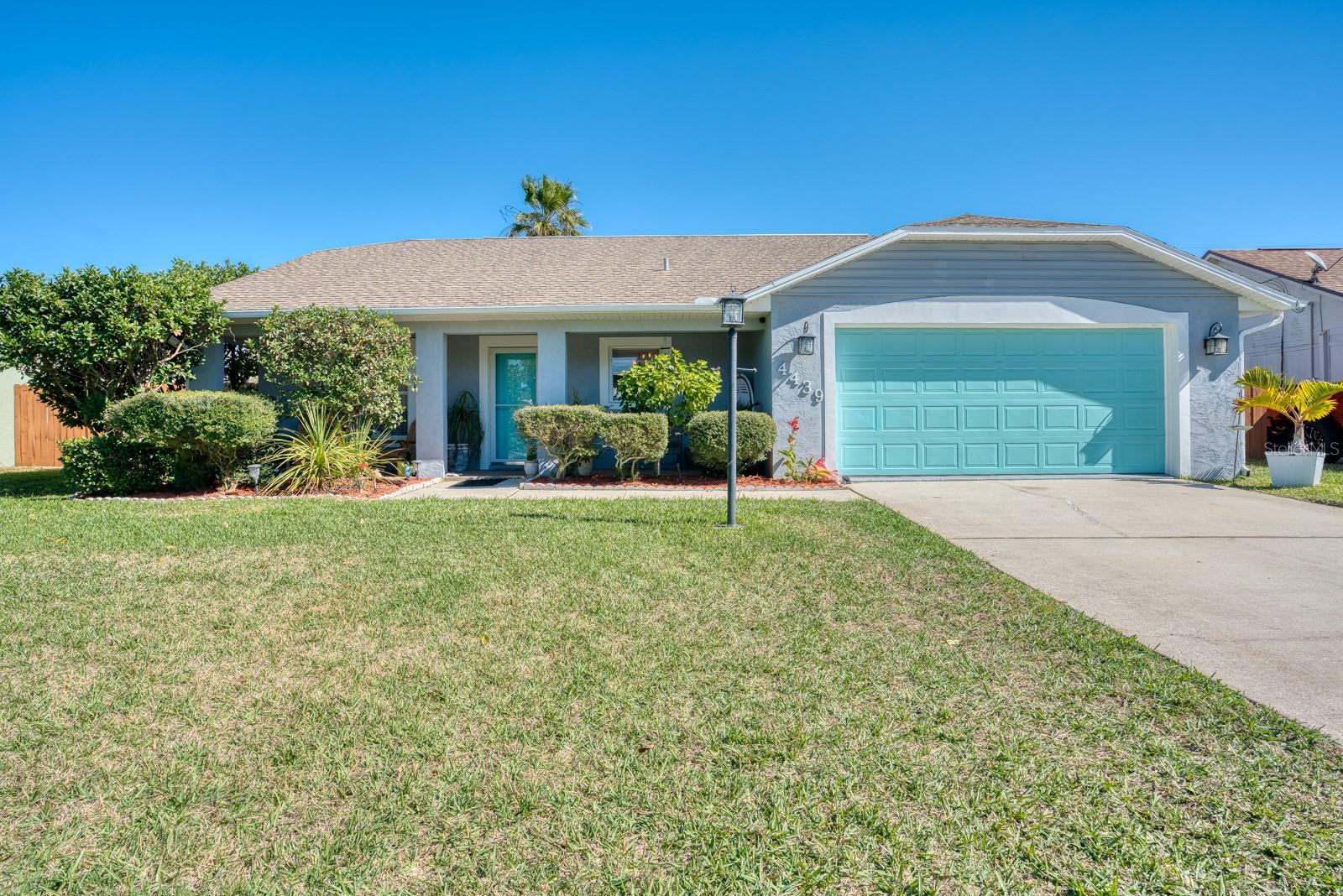 COME HOME TO YOUR TURNKEY NEW SMYRNA BEACH HOUSE THAT IS LOCATED IN THE WELL SOUGHT AFTER SILVER SANDS COMMUNITY! PRIME SETTING BEWTEEN THE RIVER AND THE SUNNY BEACH WITH TONS OF UPGRADES YOU WILL LOVE AND WILL FEEL AT HOME RIGHT AWAY BECAUSE OF ITS COZINESS AND CHARM! Home features soaring knockdown cathedral ceilings in great room area which brings in tons of natural light and all 3 bedrooms have vaulted ceilings with loft shelves to make it feel open, airy and allows you to add your personal touches for all your decorations! Both baths are beautifully updated, new wood-look tile in main areas and shiplap that adds character to your great room. Upgraded light fixtures throughout this split bedroom home and seven ceiling fans to stay.  This galley kitchen has newer SS appliances featuring a large kitchen sink!  Air conditioning system was replaced Oct 2021 paired with an Ecobee smart thermostat!! This home was recently painted inside and out! Beautifully landscaped front yard to allow a more private setting on your large covered front porch! Fenced in back yard with oversized patio and includes a corner gate to easement that provides this home with access to a shortcut that is just two blocks walking distance to the beach.  Yard has a sprinkler system, outdoor shower, and there are hurricane shutters on the east side of the home for storm protection! Garage has an 8x9 room with an a/c unit that needs finishing touches to easily convert to home office or an all-purpose space or can be taken down for true two car garage! Large Garage which could allow room for workshop! Come See Today!