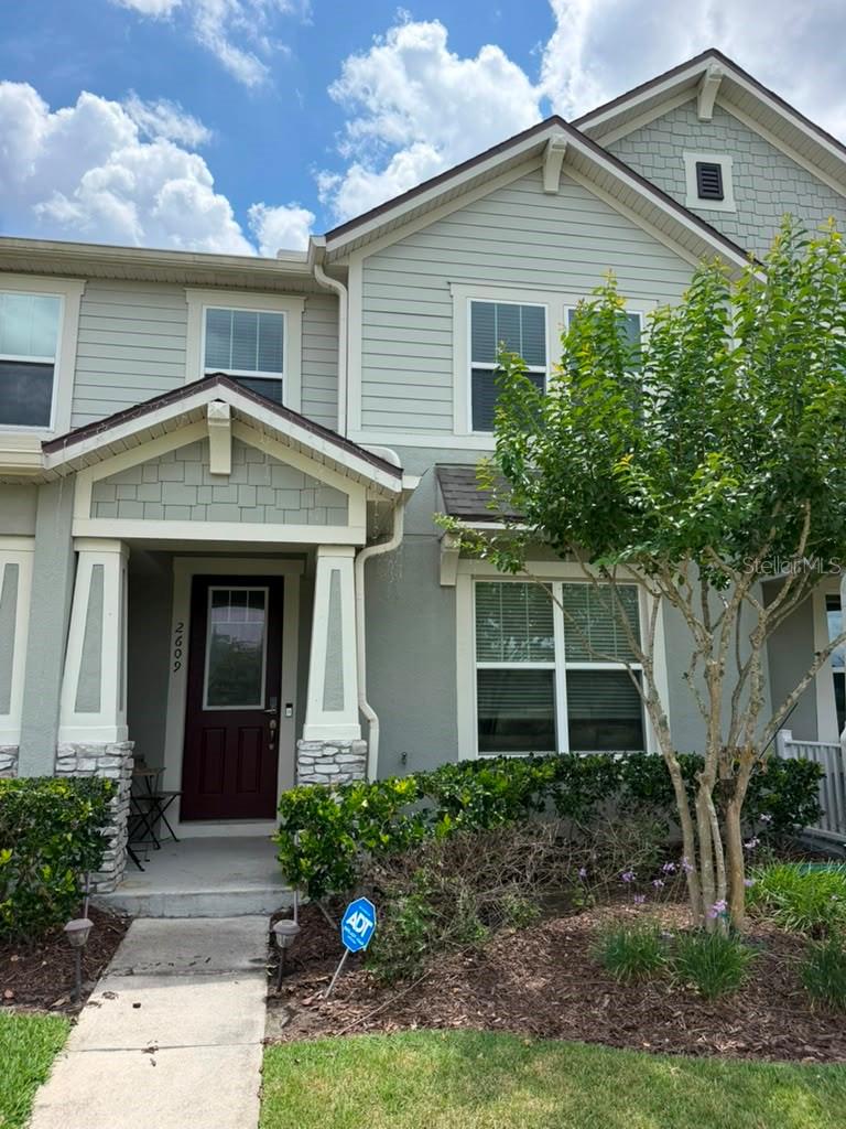 Move-in ready two-story townhome featuring 3 bedrooms and 2.5 bathrooms, located in the master-planned community of Tohoqua in Kissimmee. The first floor offers a spacious open-concept layout with an integrated living and dining area. The kitchen is equipped with granite countertops, a breakfast bar, and appliances included. Upstairs, the primary bedroom boasts an attached private covered balcony and an en-suite bathroom. Additional features include a rear-loading 2-car garage, a dedicated laundry space, and grounds maintenance included by the HOA. Conveniently situated with easy access to major roadways and community amenities. Contact us to schedule a showing.