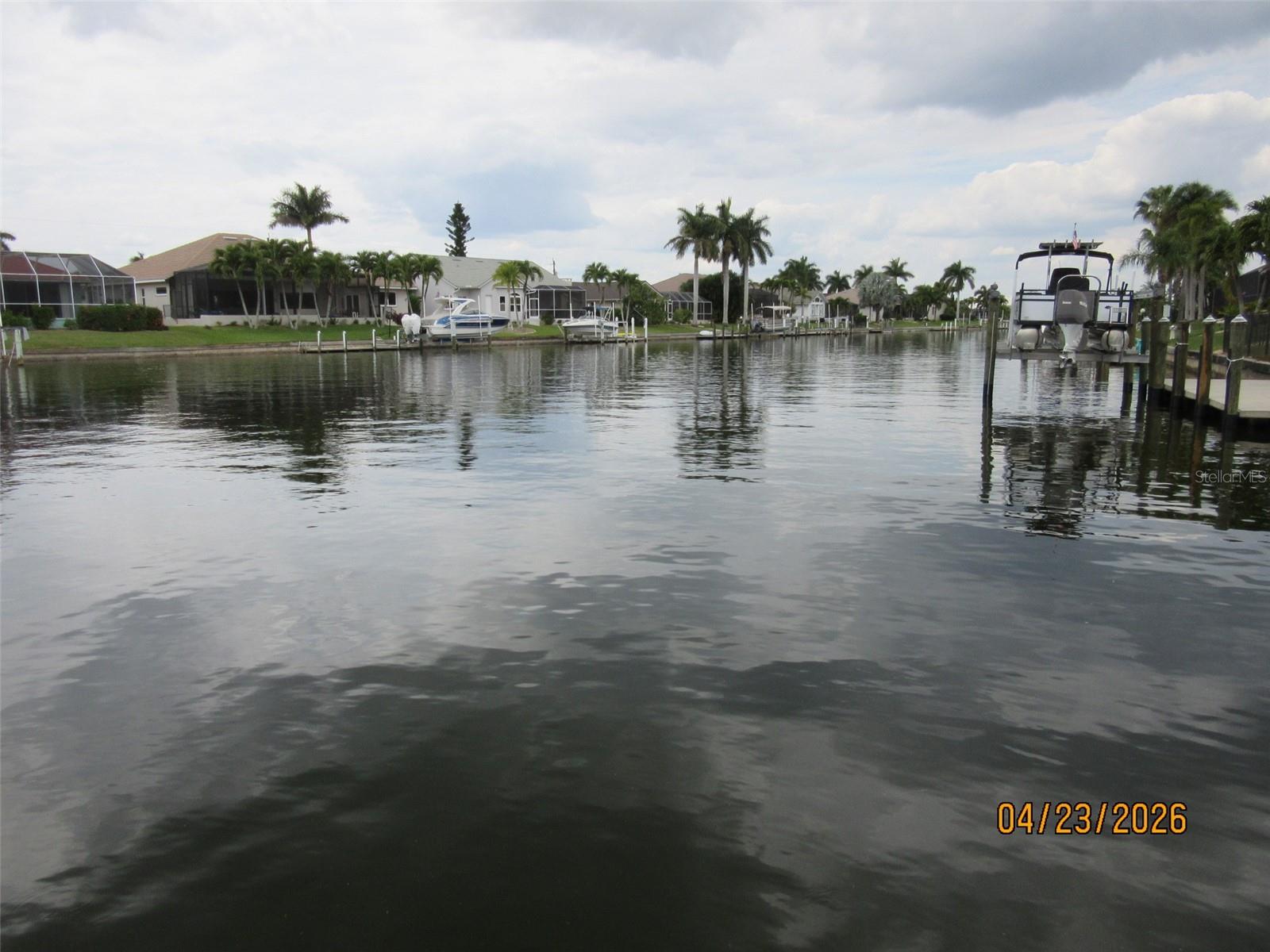 Build your Southwest Florida dream home on this exceptional oversized pie-shaped waterfront lot in the highly desirable Burnt Store Isles community of Punta Gorda. Situated on a Gulf access canal, this property is a boater’s dream featuring an existing seawall, private boat dock, and boat lift already in place—saving valuable time and expense for future development. Enjoy quick access to open water and endless opportunities for boating, fishing, and waterfront living. Conveniently located near golf, shopping, dining, downtown Punta Gorda, and beautiful Gulf beaches. Rare opportunity to secure a premium waterfront homesite in one of Punta Gorda’s most sought-after boating communities!