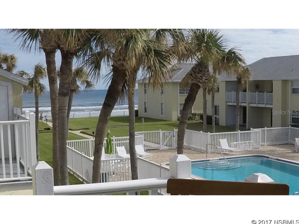 BRIGHT & FURNISHED OCEAN VIEW CONDO ON THE NO-DRIVE SECTION OF NEW SMYRNA BEACH. GREAT OCEAN VIEWS FROM THE BALCONY OF THIS ONE BEDROOM/ONE BATH UNIT WITH A DESIRABLE SOUTHERN EXPOSURE. BEAUTIFUL PERGO FLOORING INSTALLED 2016.  QUICK & EASY ACCESS TO THE TWO POOLS (1 HEATED) AND THE BEACH. TWO BBQ AREAS AVAILABLE. RESERVED, COVERED PARKING AND PLENTY OF STORAGE SPACE. THE COLONY BEACH CLUB IS A WELL MAINTAINED, LOW-RISE COMPLEX. JUST BRING YOUR TOOTHBRUSHES AND ENJOY ALL THAT NEW SMYRNA BEACH HAS TO OFFER. ;LocationDescription: Condo ;Water: City
