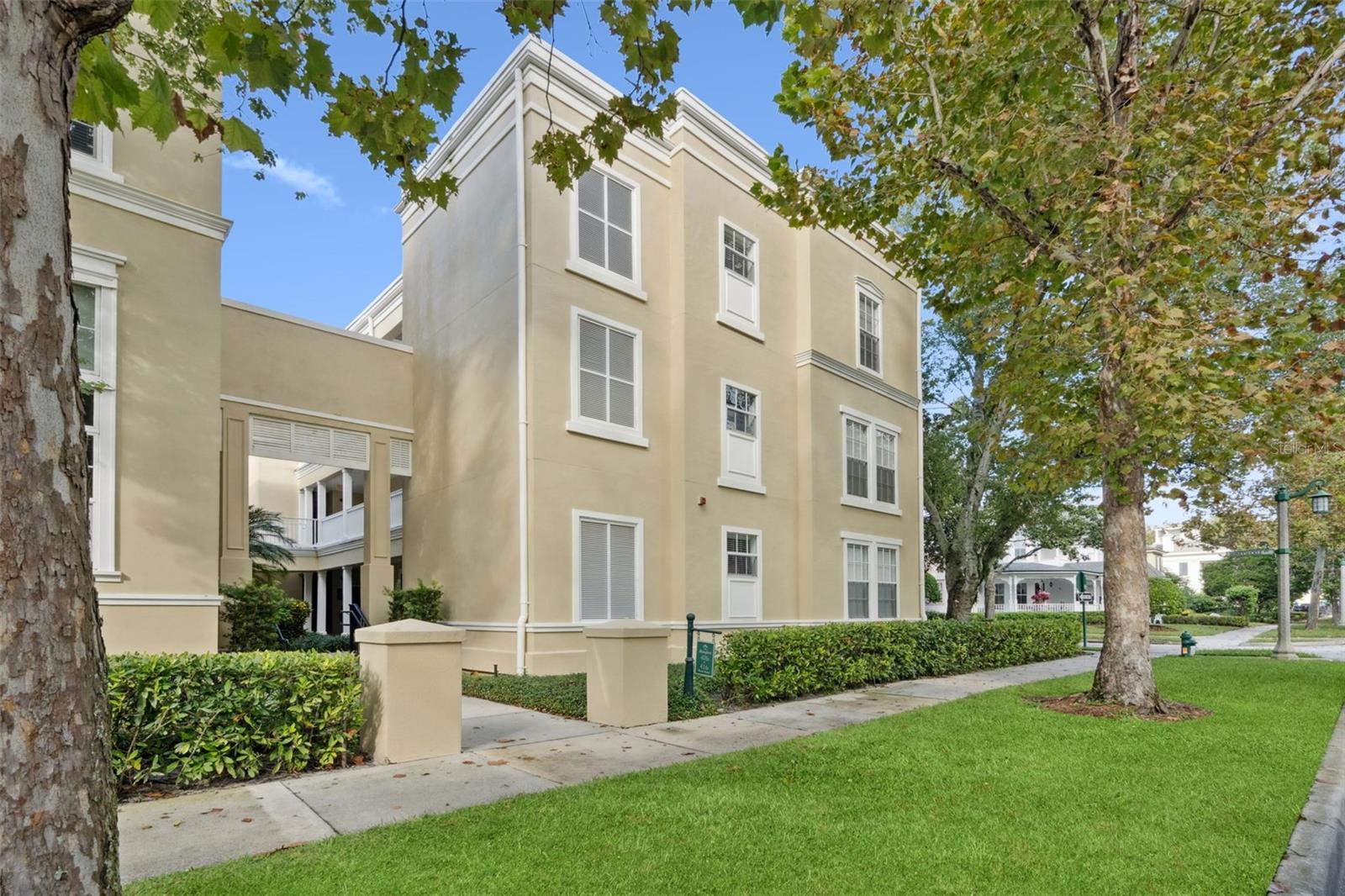 Live every day like a getaway in this rare top-floor corner unit, perfectly positioned in the heart of downtown Celebration! From your private balcony, living room, dinette, and kitchen, enjoy breathtaking water views and soak up the charm of one of Central Florida’s most iconic communities. Just steps from your front door, you’ll find Celebration’s vibrant restaurants, boutique shopping, and year-round events—plus the world-famous Celebration Golf Club is only one block away! Inside, this beautifully updated condo blends elegance with modern comfort. The chef-inspired kitchen features gleaming marble floors, solid-surface countertops, stainless steel appliances, and even a wall-mounted pot filler for a touch of luxury. The primary bathroom boasts marble flooring, a stylish vanity, and a refreshed shower, while the guest bath impresses with custom tile, a new vanity, and sleek glass shower doors. The open living and dining areas are framed by rich wood flooring and flooded with natural light—creating a bright, welcoming space that feels truly one of a kind. As a Celebration resident, you’ll have access to pristine parks, sparkling community pools, playgrounds, and over 26 miles of scenic walking and biking trails. Stroll to the charming town center for gourmet dining, live music, and seasonal festivities that capture the true spirit of Celebration living. And when adventure calls, you’re just 10 minutes from Walt Disney World and 25 minutes from Orlando International Airport—the perfect balance of convenience and magic. Don’t miss this rare opportunity to own a top-floor, corner-unit treasure in one of Florida’s most beloved communities. Your Celebration story begins here—schedule your private showing today!