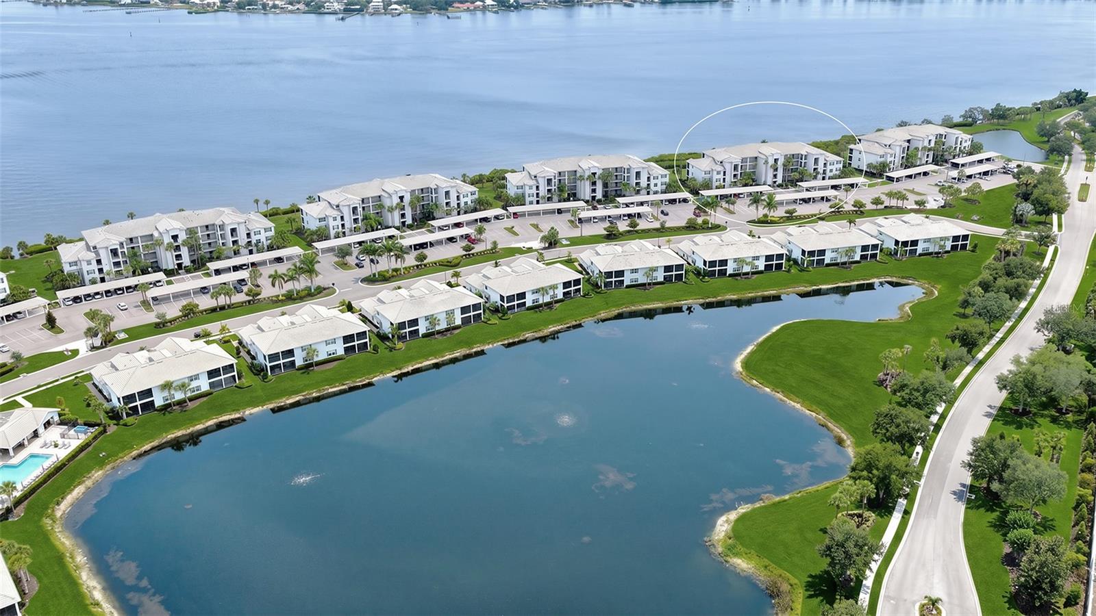 Experience waterfront living in Tidewater Preserve with this fully furnished two-bedroom, two-bath residence overlooking the Manatee River. Offering year-round water views and a move-in-ready lifestyle, this beautifully appointed home combines thoughtful features with an exceptional collection of resort-style amenities in one of Bradenton’s sought-after gated communities. The open-concept floor plan features tile flooring throughout the main living areas, crown molding, built-in dining seating and a spacious kitchen with quartz countertops, shaker-style cabinetry, pendant lighting, stainless steel appliances and an oversized island designed for everyday living and entertaining. Reverse osmosis and whole-house water filtration systems add everyday convenience and functionality. The screened lanai provides a comfortable setting to relax with morning coffee or unwind while enjoying tranquil river views and colorful sunsets. An assigned covered parking space and private storage area complete the residence. Life at Tidewater Preserve extends well beyond your front door with three resort-style pools, two clubhouses, two well-equipped fitness centers, tennis courts, scenic riverfront recreational trails, a dog park, kayak launch and private marina with boat slips and lifts available for boating enthusiasts with direct access to the Manatee River. The gated community also offers 24-hour security, an on-site lifestyle director, and beautifully maintained grounds. Ideally near shopping, dining and entertainment, this residence is also less than 30 minutes from the beaches of Anna Maria Island, offering convenient access to some of Florida’s desirable coastal destinations. Maintenance-free living with HOA fees covering lawn care, landscaping, water, sewer, trash, flood insurance, internet and an expanded cable package. Also includes an assigned covered carport parking spot just outside the building. Whether you are searching for a full-time residence or seasonal retreat, this furnished waterfront home offers an exceptional opportunity to enjoy the Florida lifestyle from day one.