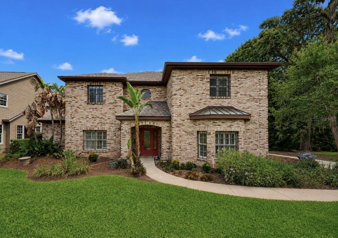 Virtually Staged. Tucked away in one of Riverview's most sought after gated communities, this exceptional estate offers a rare combination of privacy, acreage, and convenience. Situated on 1.48 acres with 139 feet of Alafia River frontage, this property is a hidden retreat just minutes from shopping, dining, top rated schools, and major commute routes. Spanning over 4,100 square feet, the home is filled with opportunity for its next owner to update, personalize, and create a truly spectacular forever home. The thoughtfully designed floor plan features a spacious first floor primary suite, dedicated office, expansive family and great rooms, and an open concept kitchen that's perfect for gathering with family and friends. Upstairs, you'll find four generously sized bedrooms, multiple full bathrooms, and an oversized bonus room ideal as a game room, media room, playroom, or additional entertaining space. Step outside to your own private oasis complete with screened pool, outdoor kitchen, and peaceful views of the surrounding mature landscape. With direct Alafia River frontage, the possibilities are endless- from creating your dream waterfront retreat to simply enjoying the serenity that comes with owning one of the areas most unique homes. Homes with this much land, space, river frontage and location rarely become available. If you've been searching for a property with incredible  bones, unmatched potential, and a setting that's impossible to replicate, this is the opportunity you've been waiting for.