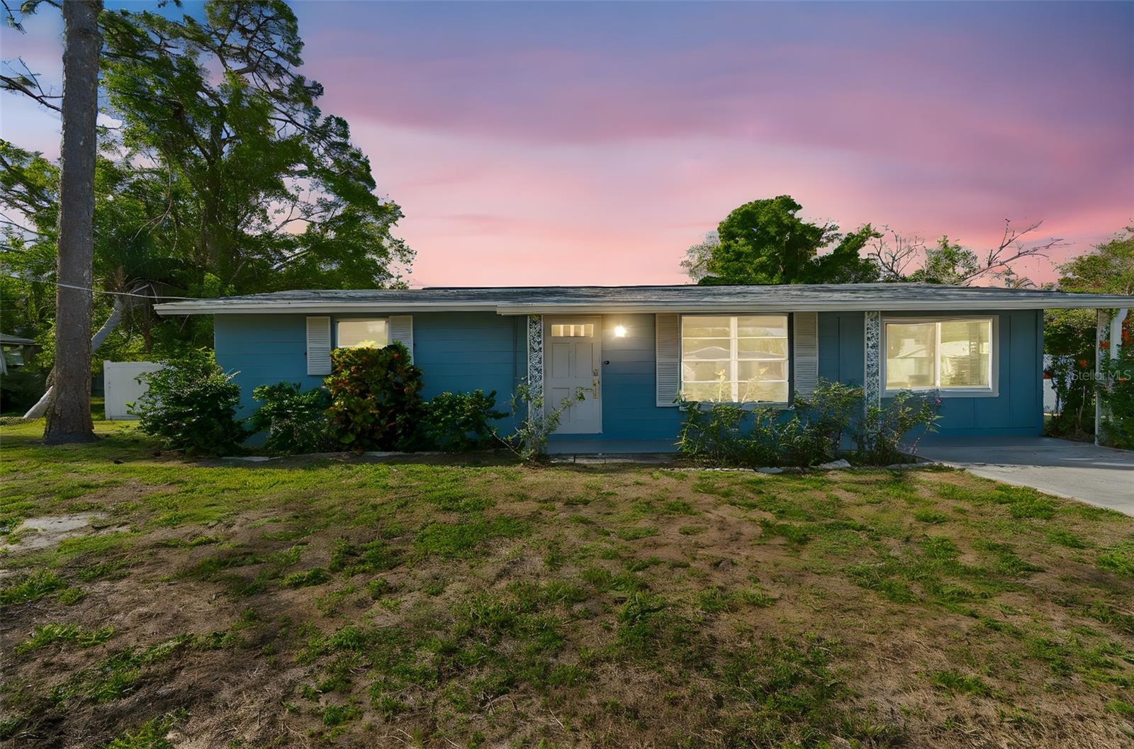 Great Block Built home in Gulf Gate with HUGE backyard! Just renovated with brand new kitchen, partially renovated bathroom (kept retro tub and tile by design),  ceiling fans, and fully painted inside and out.   Newer big ticket items include Roof (2022) and HVAC (2021).  Property located on a quiet street.   Front Loading washer and dryer in the separate laundry area off of kitchen.  The screened in lanai looks across the expansive back yard, with a huge lush lawn, which has plenty of room for an ADU and parking, if new owner ever wanted to expand.    Double auto door in vinyl fence leading to backyard for potential RV parking, if desired.   Space, space, space!