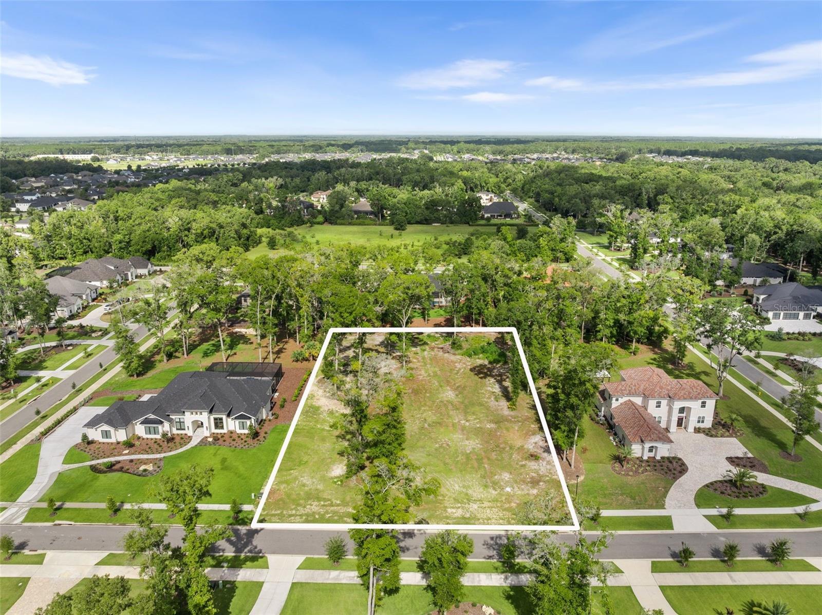 The LAST available 1-acre homesite in Oakmont’s highly desirable Estate section! This rare opportunity to build your dream home in one of Gainesville’s most sought-after communities won’t last long. This premium lot offers 150 feet of frontage and an east-facing orientation—perfect for enjoying peaceful sunset views from your back lanai

Design flexibility abounds with a minimum living space requirement of 3,800 sq ft, allowing you to create the ideal custom home to suit your lifestyle. Zoned for top-rated public schools—Chiles Elementary, Kanapaha Middle, and Buchholz High—with several esteemed private schools nearby.

Utilities include Clay Electric, GRU water and natural gas, reclaimed water, underground utilities, plus AT&T Fiber or Cox for high-speed internet.

Enjoy an unmatched amenity-rich lifestyle featuring: tennis, basketball, pickle ball courts, lap pool, splash pad, beach volleyball, a nature trail system, gopher tortoise preserve, and an interactive playground. The Residents Club offers a gym, veranda, indoor/outdoor entertaining space with a double-sided fireplace, TVs, and a catering-friendly half kitchen.

Oakmont isn't just a neighborhood—it's a lifestyle. Contact us today to schedule your private tour!