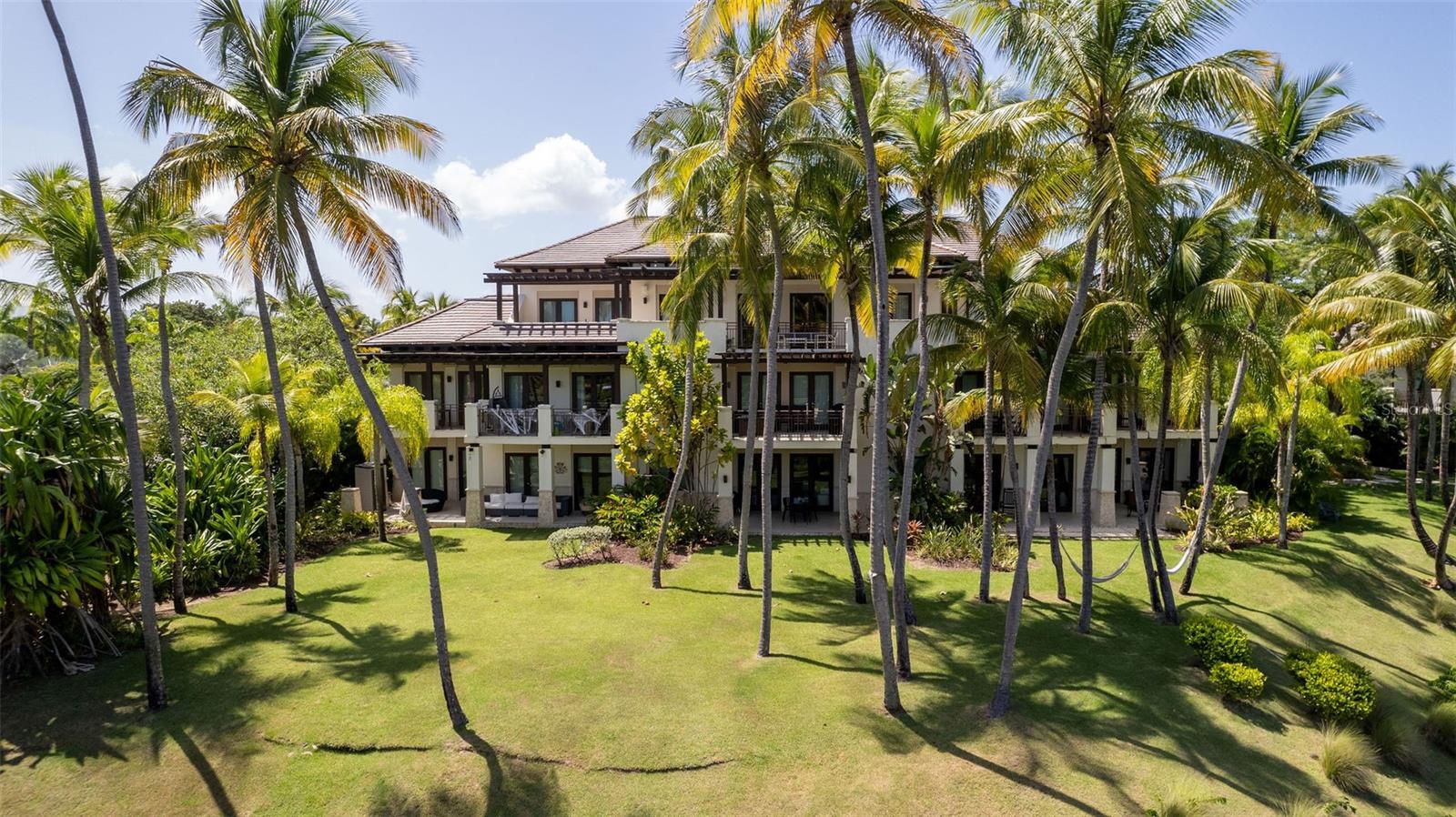 Nestled in the prestigious St. Regis Resort in Rio Grande, Puerto Rico, Las Verandas offers the perfect blend of elegance and comfort. Boasting breathtaking views of lush tropical landscapes and the sparkling Atlantic Ocean, this property features spacious interiors with modern finishes that embody sophistication. The open-concept layout includes a gourmet kitchen equipped with high-end appliances, sleek countertops, and ample storage. The living and dining areas flow seamlessly, leading to an expansive private balcony, perfect for enjoying the serene Caribbean breeze.

The property offers access to world-class resort amenities, including a championship golf course, luxurious spa, private beach, and exquisite dining options. With its prime location near El Yunque National Forest, residents can also enjoy outdoor adventures such as hiking and exploring nature’s beauty. This apartment is ideal for those seeking an exceptional lifestyle in a tropical paradise, where luxury and tranquility converge seamlessly.