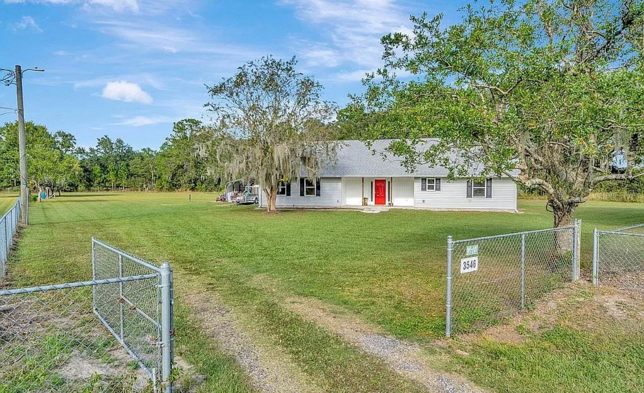 Welcome to your own private slice of country living at 3546 Fudge Rd. in Plant City! Nestled on 1.66 fully fenced acres and set back off the road for added privacy, this beautifully updated 4-bedroom home offers the perfect blend of peaceful living with quick access to I-4, shopping, dining, and everything in between Tampa to Orlando.
Bring all your toys, trailers, RVs, boats, and outdoor fun there’s plenty of room to spread out and enjoy the property. Surrounded by mature trees and open space, this property gives you the freedom and flexibility you’ve been looking for without HOA restrictions.
Inside, you’ll love the many upgrades throughout including fresh paint, crown molding, upgraded baseboards, custom lighting, custom shelving, and an inviting electric fireplace that adds warmth and charm to the living space. The kitchen features stainless steel appliances, custom cabinetry, upgraded pantry storage, and a stylish coffee bar perfect for entertaining or everyday living.
Whether you’re looking for room to grow, space for hobbies, or simply a more private lifestyle close to town, this property checks all the boxes. Don’t miss your opportunity to own this move-in ready home on gorgeous acreage in the heart of Plant City!