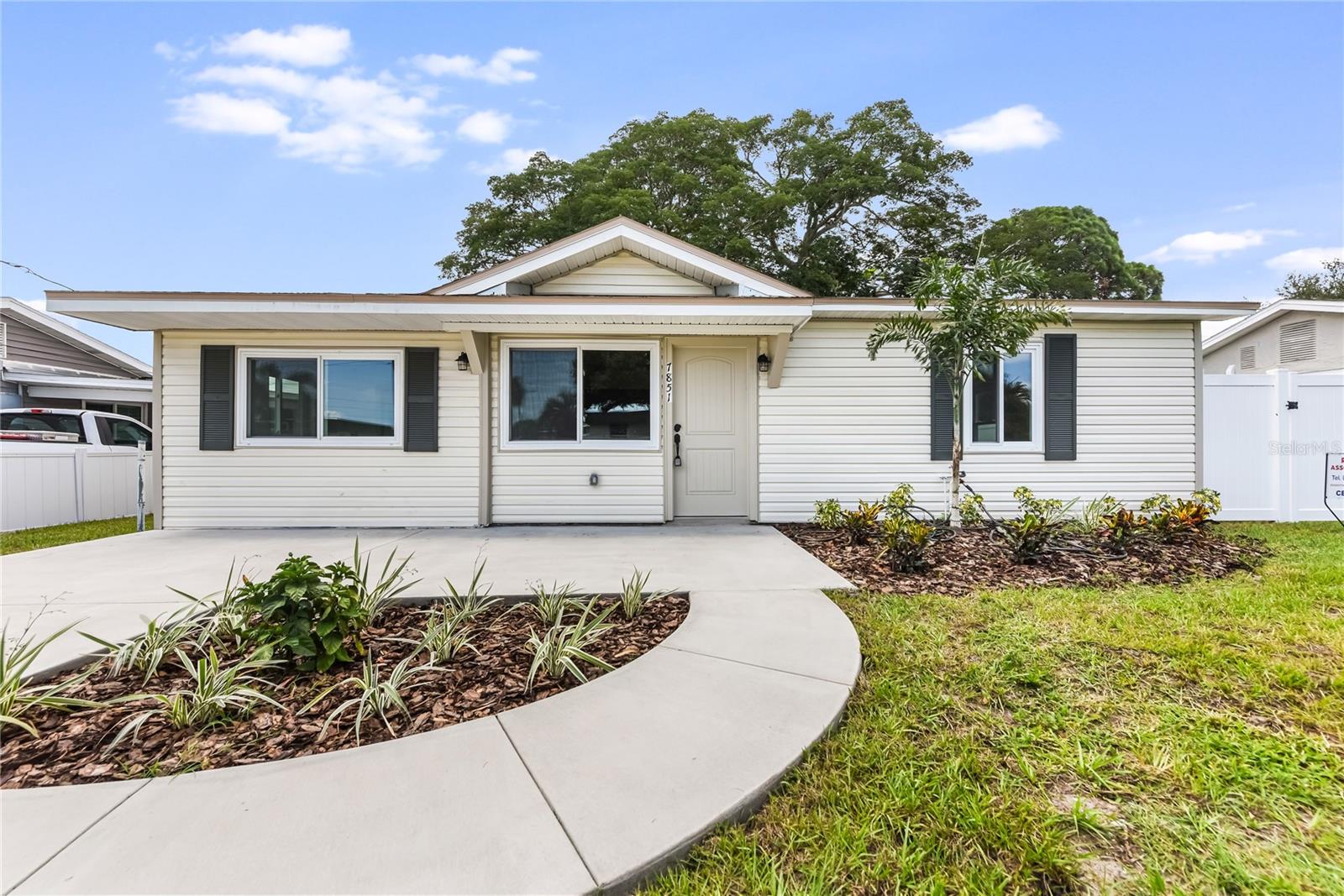 **Better than new!** Completely rebuilt from the studs up, this exceptional St. Petersburg home offers the quality and peace of mind of new construction while retaining the charm of an established neighborhood. **Located in Flood Zone X, no flood insurance is required.** Every aspect of this home has been meticulously renovated with exceptional attention to detail. **Professionally renovated with permits**, virtually every major component has been replaced, allowing you to enjoy the confidence of a truly turnkey home.

**Virtually every major component is brand new, including the roof, hurricane rated impact windows, plumbing, electrical, ductwork, HVAC system, water heaters, insulation, drywall, texture, paint, and premium finishes throughout.**

The heart of the home is the **designer inspired gourmet kitchen** boasting custom high end wood cabinetry, quartz countertops, full height quartz backsplash, pot filler, recessed LED lighting, and premium finishes throughout. Luxury Vinyl Plank flooring flows seamlessly throughout the home, creating a modern feel. Every finish was thoughtfully selected to create a home that is both timeless and functional for modern living.

The **spa like primary suite** offers a double sink furniture style vanity and an oversized walk in shower with upscale finishes. The guest bathroom is equally impressive, featuring a large soaking tub with a quartz bench and designer fixtures.

Step outside to enjoy the extensive exterior improvements including a new driveway, expansive paver patio, fresh landscaping, new vinyl siding, and a fully fenced backyard with a new vinyl privacy fence. The **large backyard offers plenty of room for entertaining, pets, recreation, or even a future pool.**

This is a rare opportunity to own a truly turnkey home where every major component has been replaced and upgraded. Enjoy all the benefits of new construction with the charm of an established St. Petersburg neighborhood.

**Move in ready.** A home renovated to this level is rarely available. Simply move in and enjoy years of worry free homeownership. Schedule your private showing today before this one is gone!