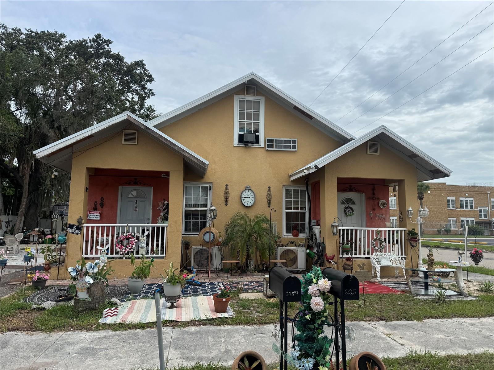 Formerly registered as a daycare, this property is now being utilized as an income-producing triplex. The property features two downstairs 2-bedroom, 1-bath units and a renovated upstairs efficiency apartment with private rear access. Recent improvements include fresh paint, updated landscaping, newer plumbing and electrical systems, and separate electric meters for each unit, with tenants responsible for their own electric service. While some cosmetic updates may still be desired, many of the major-ticket items have already been addressed, making this a great opportunity for investors or owner-occupants alike. Property is being sold as-is. Buyers are welcome to conduct inspections, and the home has been competitively priced for a quick sale!