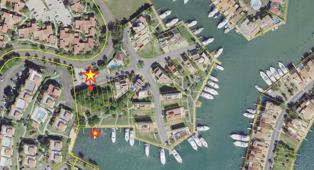 An extraordinary opportunity to own a rare waterfront vacant lot in Peninsula de San Juan, one of the most exclusive and highly coveted enclaves within the Palmas del Mar resort community. Known for its privacy, 24/7 security, serene surroundings, and direct access to the marina, Peninsula de San Juan offers a refined coastal lifestyle favored by boating enthusiasts and luxury homebuilders alike.

This unique marina-front lot includes a private boat slip directly in front of the property, allowing you to dock your vessel just steps from your future residence—a true dream scenario for most boaters. The spacious slip can accommodate boats up to 55ft. long which is an exceptional feature. Security guard right in front of the slip 24/7!

Perfectly suited for building your custom dream home, the lot offers beautiful marina views, tranquil water reflections, and a relaxed nautical ambiance that defines life on the water. The setting combines the peaceful rhythm of the marina with the unmatched convenience of having your boat literally at your doorstep.

All essential utilities are already available and connected, including water, electricity, and internet, streamlining the construction process. Residents of Peninsula de San Juan also enjoy exclusive recreational facilities, including a private community pool and designated visitor parking, adding comfort and convenience for both homeowners and guests. Also, as a resident of Palmas del Mar, you’ll enjoy access to a full range of resort amenities, including restaurants, cafés, banks, shops, golf courses, tennis facilities, beach access, and the Yacht Club, all within a secure, master-planned community. HOA $270/Mth. plus a $85 monthly slip maintenance fee.

This is a rare chance to secure a true waterfront marina lot in one of Puerto Rico’s most prestigious resort communities—offering lifestyle, convenience, and long-term value in one remarkable property. Please call now for a private appointment!