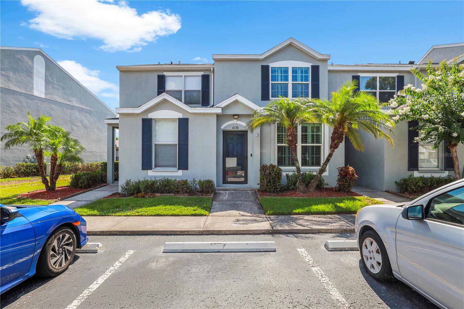 Short Sale. Welcome to Osprey Run, a gated townhome community conveniently located near US-301, I-75, shopping, dining, and downtown Tampa. This 2-bedroom, 2.5-bath townhome offers 1,360 square feet of living space and a desirable pond-view setting from the screened-in lanai.

The main level features an open-concept layout with stained concrete flooring throughout the living and dining areas, creating a modern and low-maintenance living space. The kitchen is equipped with granite countertops, shaker-style cabinetry, tile backsplash, LED lighting, and a breakfast bar that overlooks the living area.

Upstairs, both bedrooms function as private suites, each with its own en-suite bathroom, providing flexibility for owners, guests, or roommates. Additional interior features include plantation shutters, crown molding, custom wall accents, vaulted ceilings, a Nest thermostat, and surround sound in the living room.

Enjoy relaxing mornings or evenings on the screened lanai overlooking the pond and green space. Recent improvements include a new water heater installed in 2024, a newer French door leading to the screened lanai, refreshed interior paint, and a 2026 exterior building repaint completed by the association, providing added peace of mind for the next owner.

Residents of Osprey Run enjoy access to community amenities including a pool, playground, dog park, and sidewalks throughout the neighborhood. With easy access to major commuter routes, schools, shopping, and entertainment, this home offers both comfort and convenience. Sale price and terms subject to lender approval.