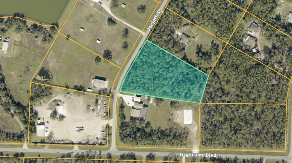 Don’t miss the opportunity to own a stunning 3.65-acre parcel in the highly sought-after North Port Estates. This spacious, wooded lot provides over 400 feet of road frontage and offers endless possibilities for your dream project.

Key Features:

Size & Privacy: Enjoy over 3.5 acres of completely wooded land, allowing you to clear as much or as little as you want for total privacy. Whether you’re building a private estate, creating a horse property, or establishing a business that requires room for heavy equipment, this lot offers it all.

Location: Only 2 miles from I-75, you'll have easy access to everything Florida has to offer, from world-class beaches to boating, fishing, golfing, shopping, and waterfront dining. Plus, you’re just a short drive from MLB pre-season training camps!

No Flood Zone: This property is NOT in a flood zone, ensuring peace of mind when building or developing.

Endless Possibilities: Whether you're envisioning a private oasis, a horse farm, or a place of business that requires a large area to store  equipment, and materials, this property is a blank canvas waiting for your vision.