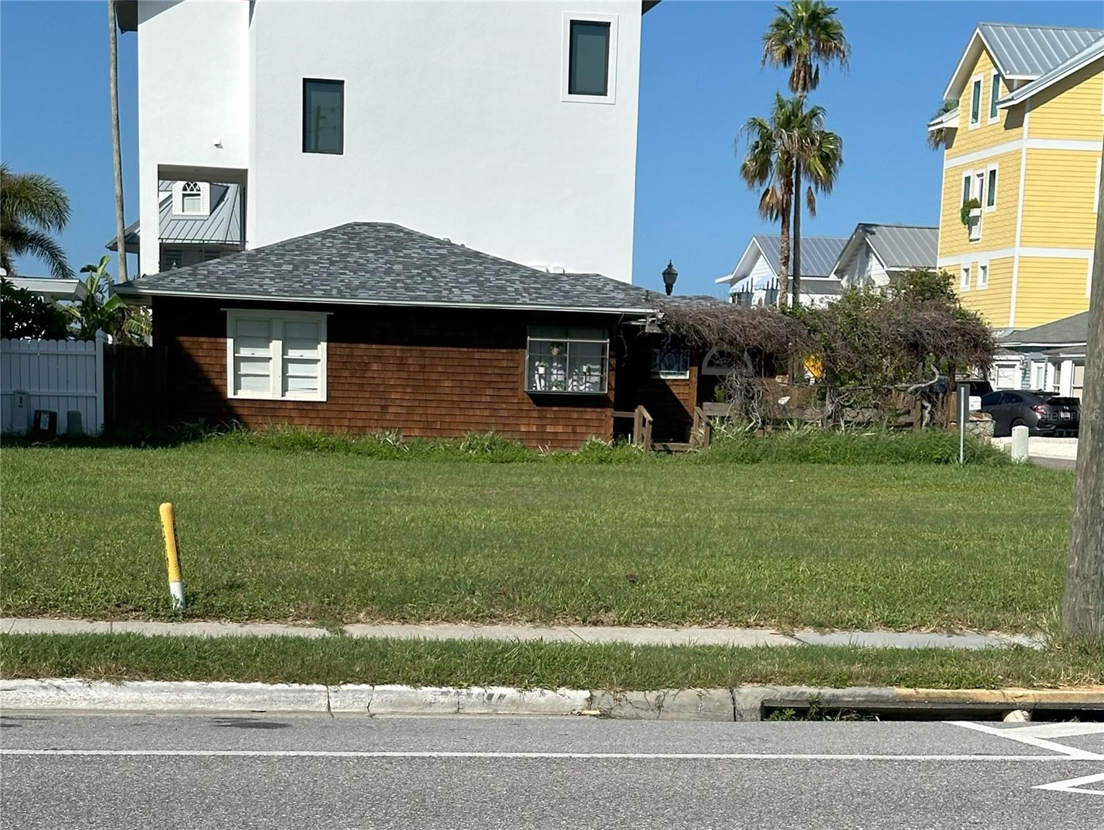 Location, Location, Location! This unique buildable residential lot in Redington Shores includes deeded private beach access and is located on the beach side of Gulf Blvd (near the corner of Gulf Blvd and 181rst). Lot 20 of the Surfside Cabana Club includes deeded membership to the Surfside Cabana Club which has a gated private beach access and includes: two covered pavilions, shower, grill area, seating area, etc. all available for only $30 per year! Live the dream with the beach as your backyard! Fantastic opportunity to build your dream beach home to suit your needs and the lot is ready to build. This buildable lot allows for a large home. Based on the variance granted the adjacent lot, a 5-foot variance is highly likely to be granted which will align the home with the setbacks for the neighboring property. This lot is large enough to accommodate a large five-bedroom home. Attached are AI generate plans of what could possibly be built. No HOA. Rare beach access location. Imagine having your morning cup of coffee on the beach and enjoy the fantastic sunsets every evening just a few yards from your door. Lot 21 is also available for sale. Endless options. Build your dream home and have one for rental income.