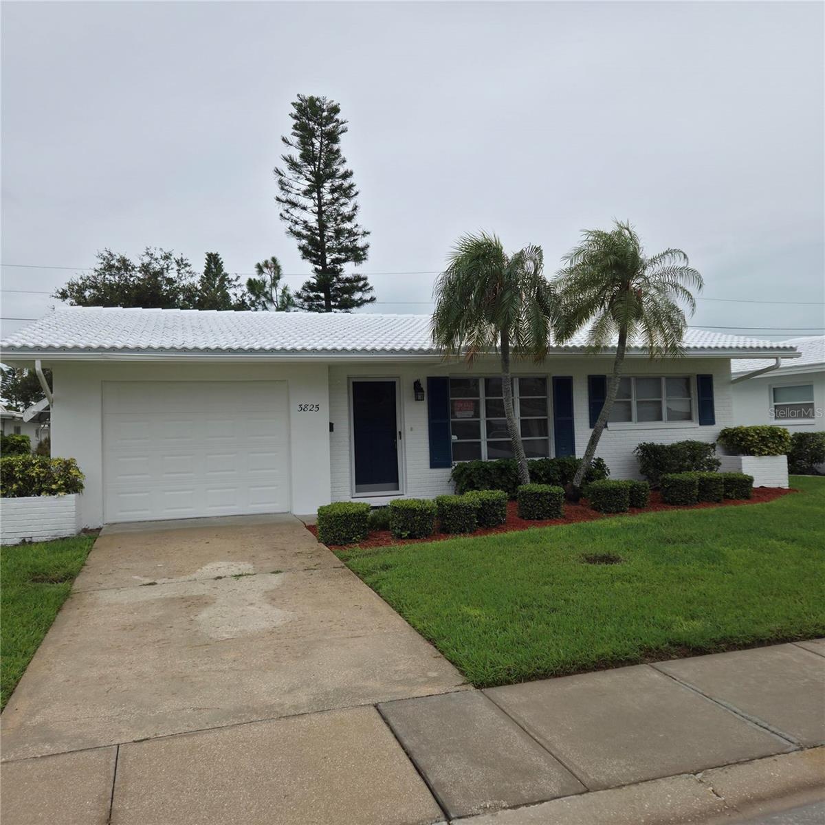 Welcome to this charming condominium located at 3825 97th Ave N in Pinellas Park, FL. This lovely 2 bedroom, 1 bath, 1 car garage is ready for you to make it your own. Priced as the lowest in the desirable The Mainlands of Tamarac. A true vibrant community awaits as you are a short walk to the Unit 3 clubhouse and heated pool. Lots of activities in this golf cart friendly neighborhood including dances, game nights, shuffleboard, dinner theme nights, and the Mainlands public golf course. The monthly HOA includes exterior maintanance, lawn care, water, sewer, trash, cable