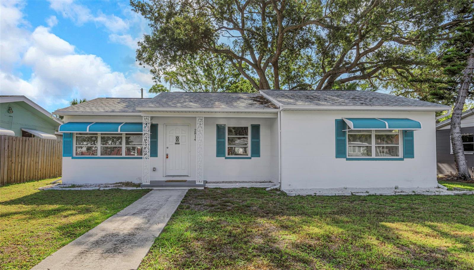 Located in Gulfport's sought after Marina District, this beautifully renovated masonry home is move in ready and offers over 1,000 square feet of thoughtfully designed living space. The spacious open living and dining areas create an inviting setting for everyday living and entertaining. At the heart of the home is a brand new kitchen featuring stone countertops, stainless steel appliances, abundant storage, and custom built pantry shelving.

Both bedrooms are generously sized with large built-in closets, while plentiful storage throughout the home includes multiple hall closets, linen storage, and thoughtfully designed built ins. The refreshed bathroom, new kitchen and bath vanities, and modern lighting fixtures complete the home's fresh contemporary appeal.

Adding even more living space is a bright and airy Florida room overlooking the backyard. Offering nearly 200 square feet of air-conditioned space that is not reflected in the public records, it is the perfect place for a home office, reading room, or additional family room.

Outside, you'll appreciate the rear alley access with off-street parking, a covered carport, and a separate laundry room with washer and dryer hookups. Major improvements provide peace of mind, including a 2022 roof, brand-new HVAC system, brand-new water heater, and permitted renovations throughout.

Enjoy all that Gulfport's vibrant Marina District has to offer. Clam Bayou Nature Park is just down the street, while Gulfport's charming waterfront downtown is only minutes away, offering a sandy beach, fishing pier, locally owned restaurants, boutique shopping, art galleries, and the city's popular year round festivals and events.