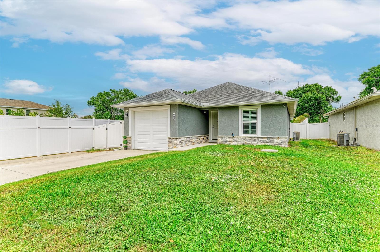 Built in 2020 and thoughtfully designed for today's lifestyle, this move-in-ready Sarasota home offers the rare combination of modern construction, stylish finishes, and the freedom of no HOA restrictions. From the moment you step inside, you'll appreciate the bright, open-concept layout that brings together the kitchen, dining area, and living space in a way that feels both comfortable and connected. White shaker cabinetry, stone countertops, stainless steel appliances, luxury vinyl flooring, and abundant natural light create a clean, contemporary aesthetic that feels welcoming from the start. The split-bedroom floor plan provides privacy and functionality, with a spacious primary suite featuring a walk-in closet and beautifully finished bath. A comfortable guest bedroom and second full bath offer flexibility for visitors, a home office, or everyday living. Outside, the lifestyle continues. The screened lanai creates the perfect space for morning coffee or evening gatherings, while the fully fenced backyard offers room to entertain, garden, play, or simply enjoy Florida's year-round sunshine. The pool adds a fun and refreshing outdoor retreat, creating a backyard that feels larger and more versatile than many homes in this price range. Located in the heart of Sarasota, you'll enjoy convenient access to Fruitville Road, I-75, shopping, dining, parks, top-rated schools, downtown Sarasota, and the area's world-renowned Gulf Coast beaches. Whether you're a first-time buyer, seasonal resident, downsizing, or simply looking for a newer home with modern finishes and minimal maintenance, this property offers an exceptional opportunity. Built in 2020. No HOA. No flood insurance required. Just modern Sarasota living, exactly the way it should be.